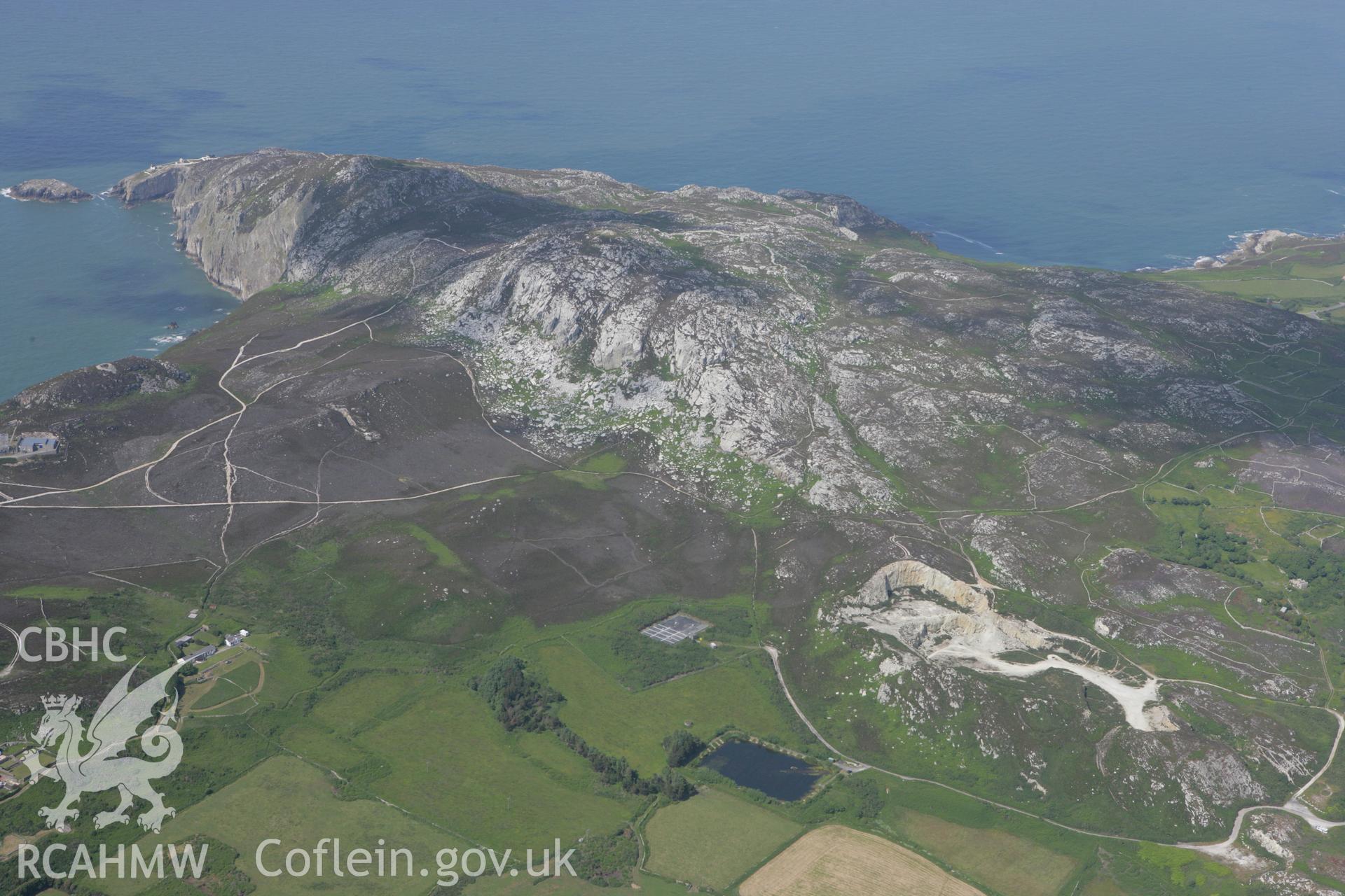 RCAHMW colour oblique photograph of Caer-y-Twr Stone Walled Roman Fort, Holyhead Mountain, from the south-west. Taken by Toby Driver on 13/06/2008.