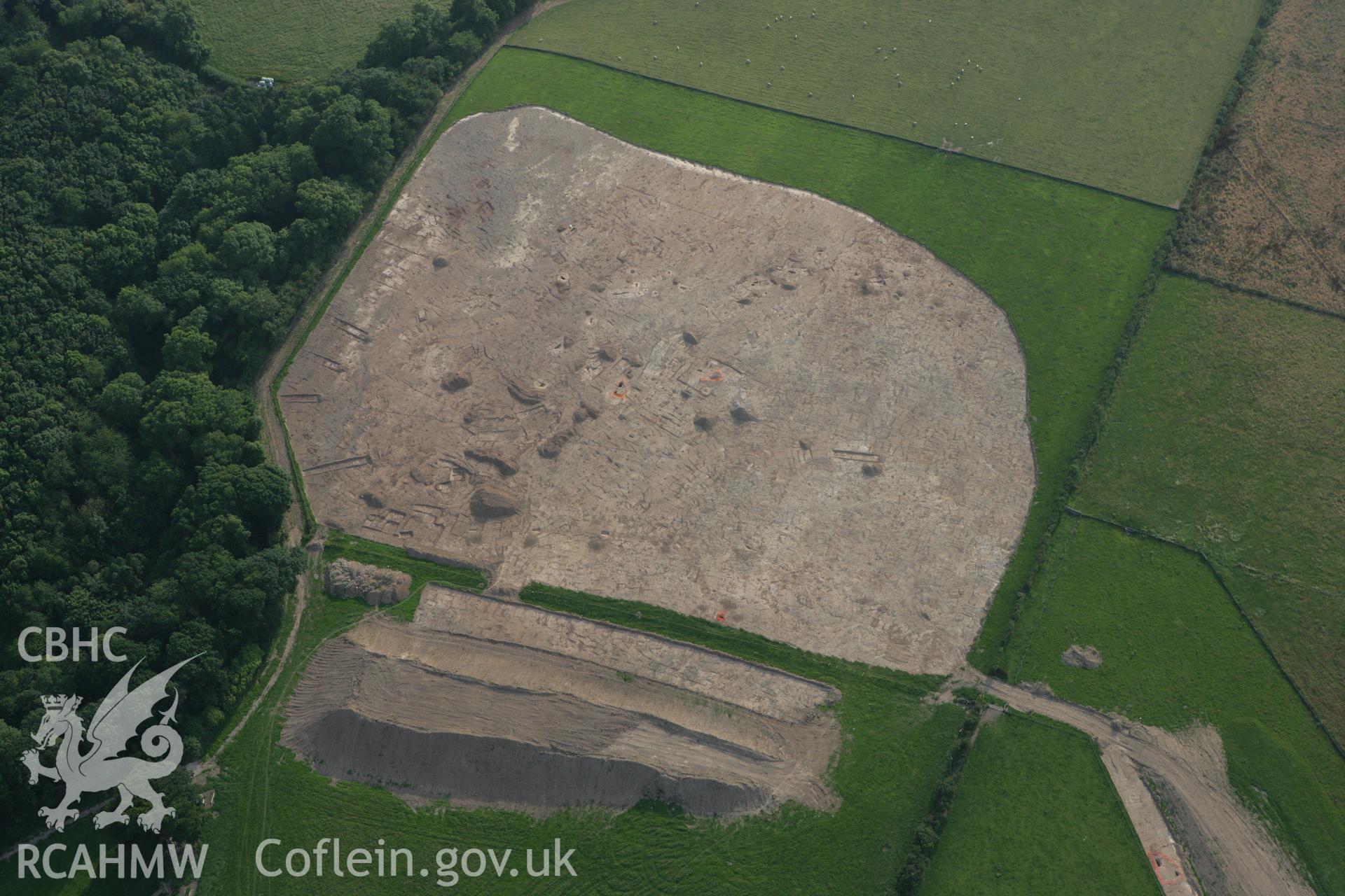 RCAHMW colour oblique photograph of Excavations, Dinorben Hillfort. Taken by Toby Driver on 24/07/2008.