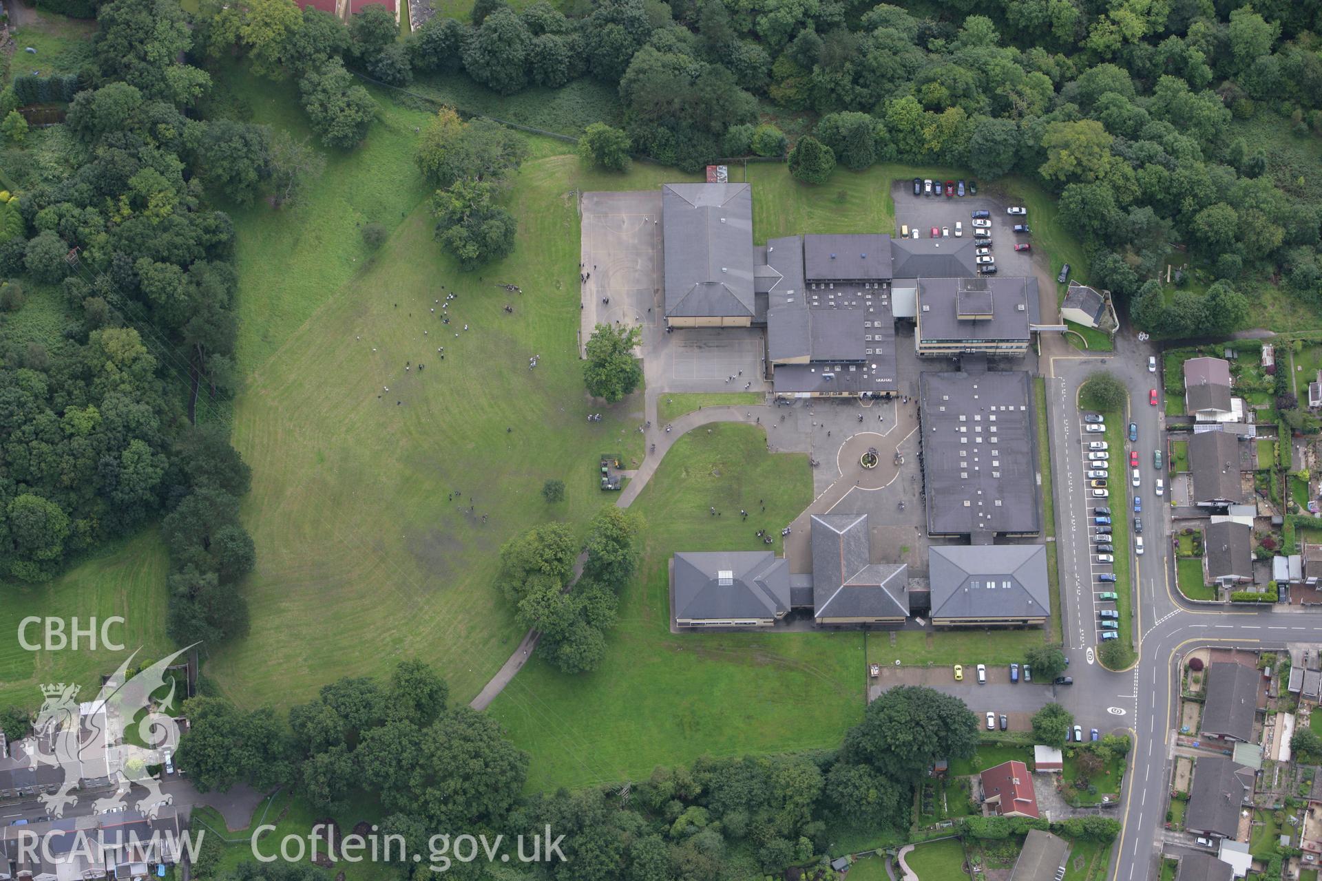 RCAHMW colour oblique photograph of St John the Baptist High School, on the site of the former Glandare House. Taken by Toby Driver on 12/09/2008.