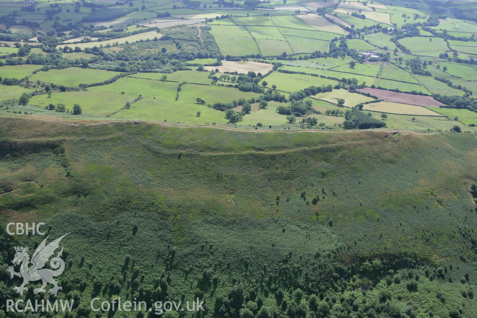 RCAHMW colour oblique photograph of Skirrid Fawr Summit Enclosure, from the west. Taken by Toby Driver on 21/07/2008.