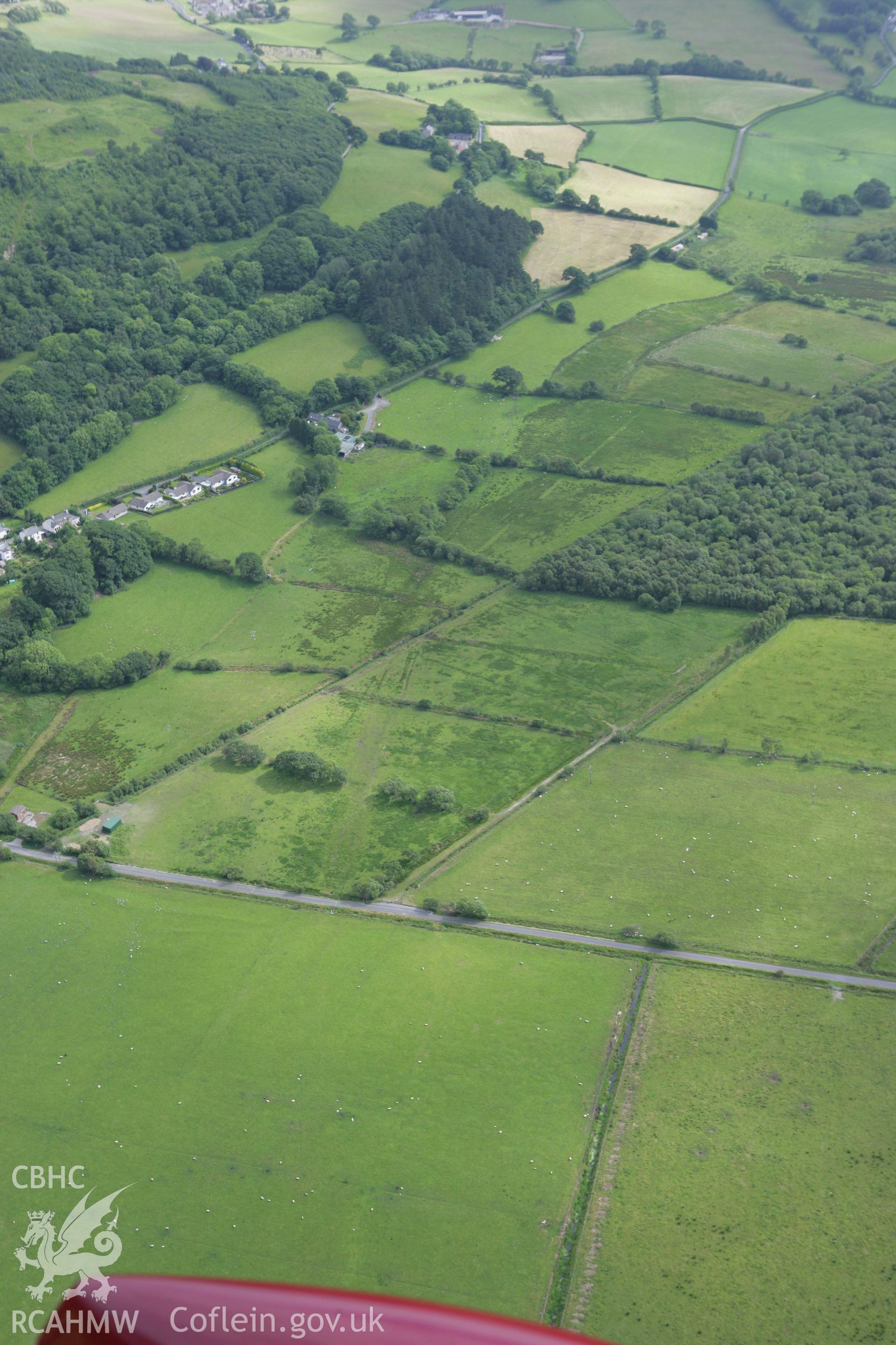RCAHMW colour oblique photograph of Tan-yr-Allt, Tre Taliesin. Taken by Toby Driver on 13/06/2008.