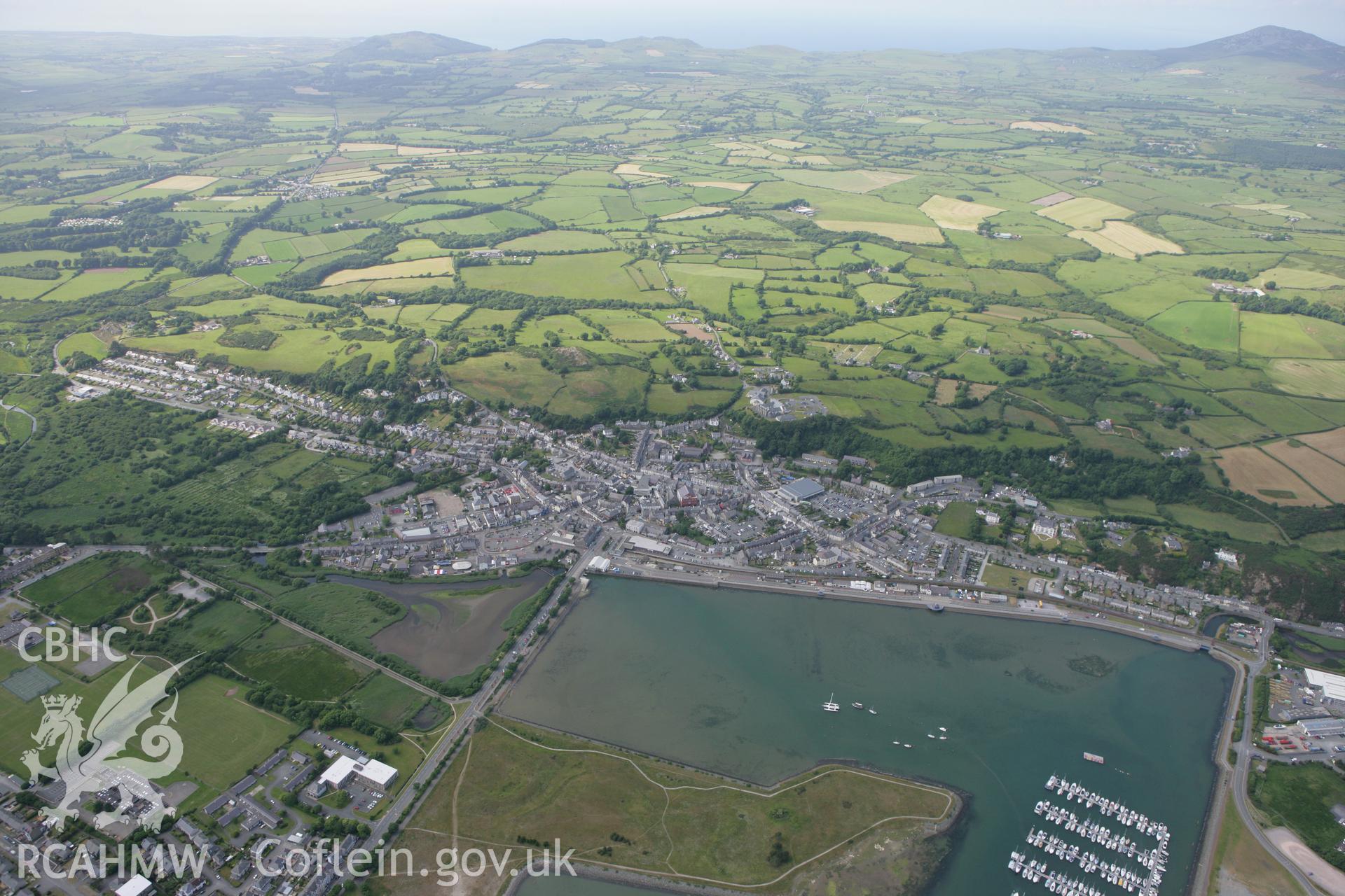 RCAHMW colour oblique photograph of Pwllheli, harbour and town. Taken by Toby Driver on 13/06/2008.