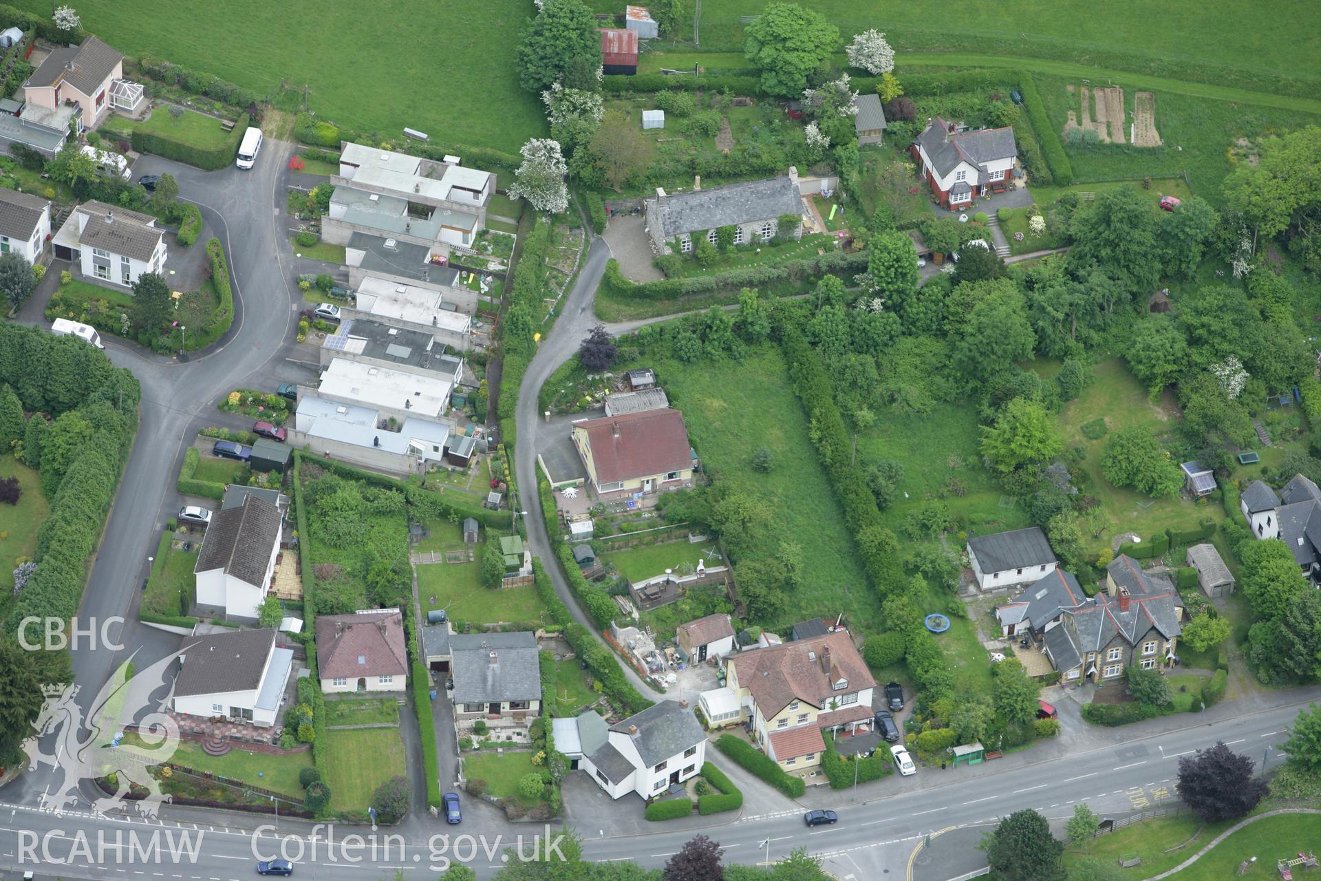 RCAHMW colour oblique photograph of Llandre village with the National School. Taken by Toby Driver on 20/05/2008.