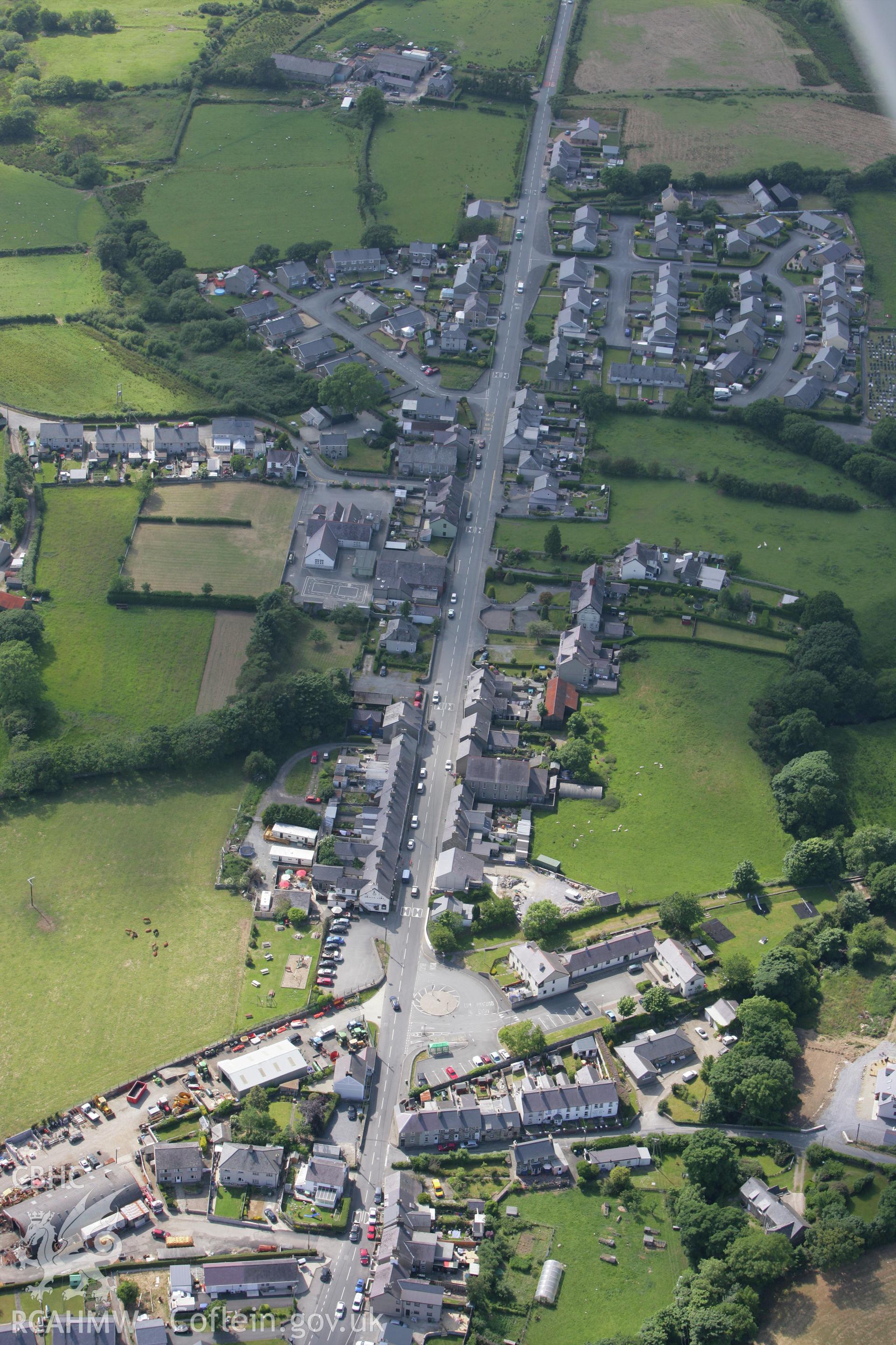 RCAHMW colour oblique photograph of Chwilog village, view from the east. Taken by Toby Driver on 13/06/2008.