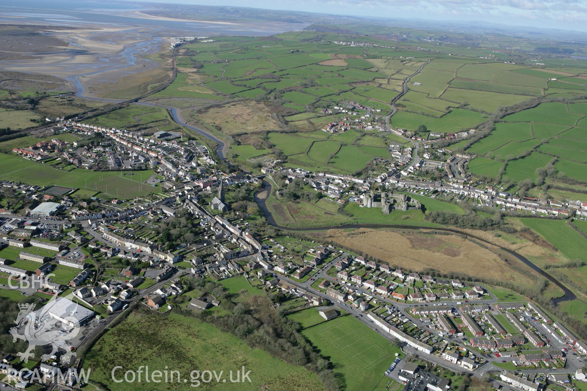 RCAHMW colour oblique photograph of Kidwelly. Taken by Toby Driver on 04/03/2008.