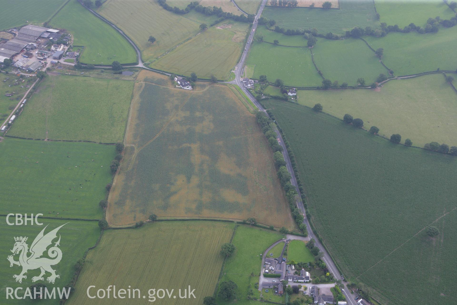 RCAHMW colour oblique photograph of non-archaeological cropmarks. Taken by Toby Driver on 24/07/2008.