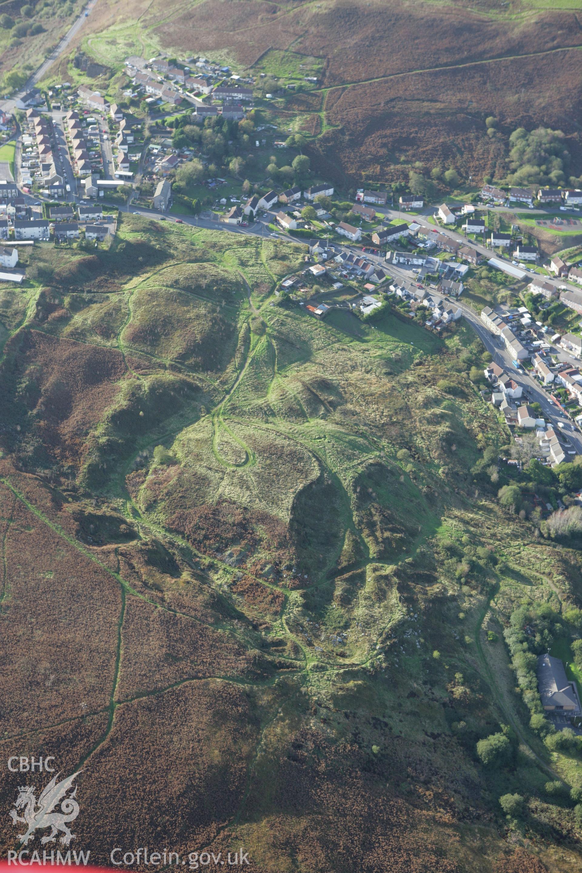 RCAHMW colour oblique photograph of Castell Coryn and Glawty Cottage (site of), abandoned settlement in quarry above Trebanog. Taken by Toby Driver on 16/10/2008.