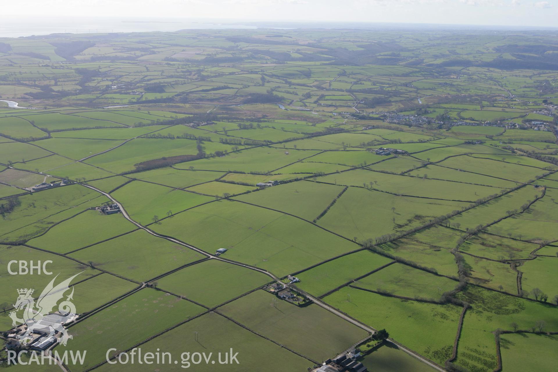 RCAHMW colour oblique photograph of landscape looking west towards St Clears. Taken by Toby Driver on 04/03/2008.