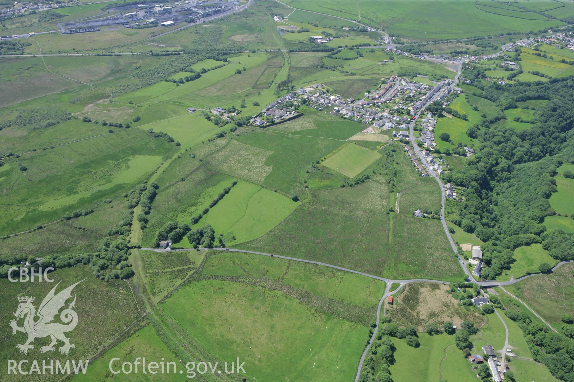 RCAHMW colour oblique photograph of Coelbren village, from the east. Taken by Toby Driver on 09/06/2008.