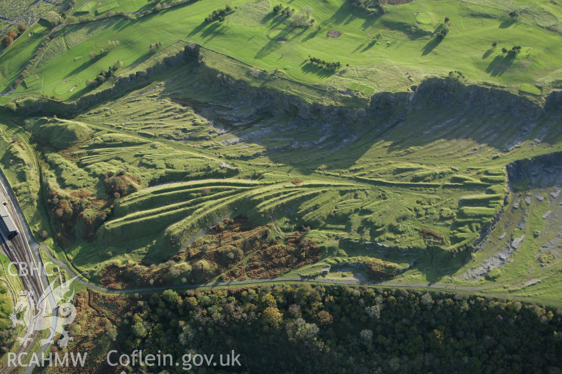 RCAHMW colour oblique photograph of Morlais Castle, quarries to the east. Taken by Toby Driver on 16/10/2008.