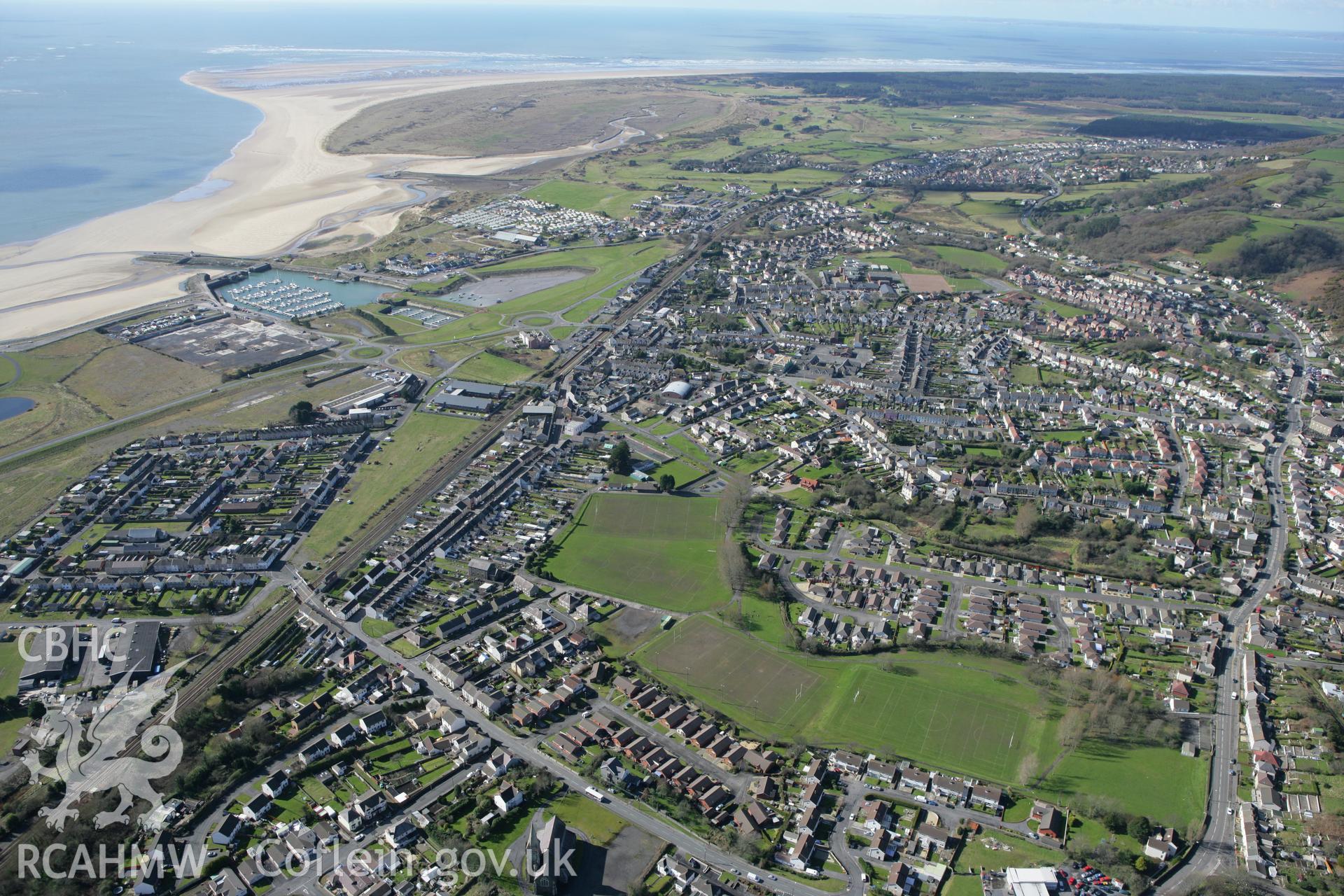RCAHMW colour oblique photograph of St Mary's Church, looking west over Burry Port. Taken by Toby Driver on 04/03/2008.