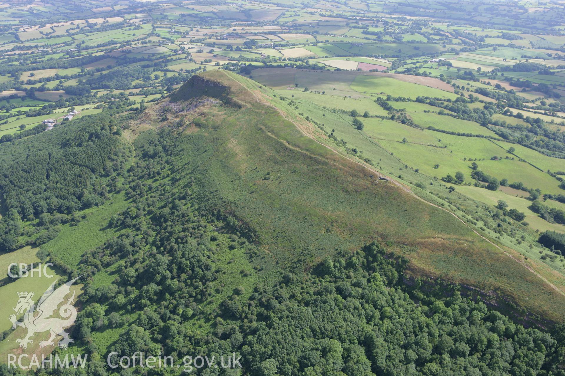 RCAHMW colour oblique photograph of Skirrid Fawr Summit Enclosure, from the south-west. Taken by Toby Driver on 21/07/2008.