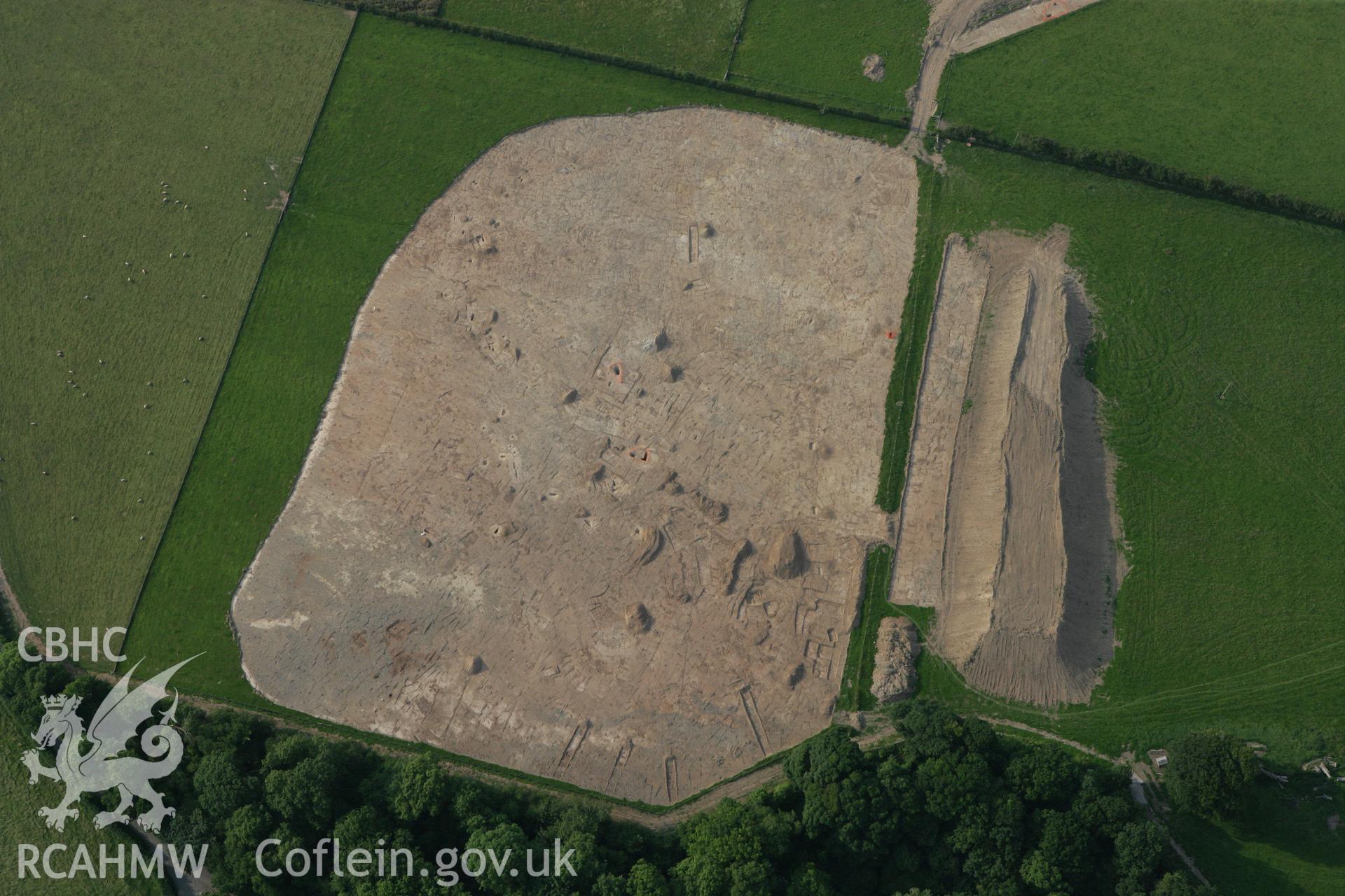 RCAHMW colour oblique photograph of Excavations, Dinorben Hillfort. Taken by Toby Driver on 24/07/2008.