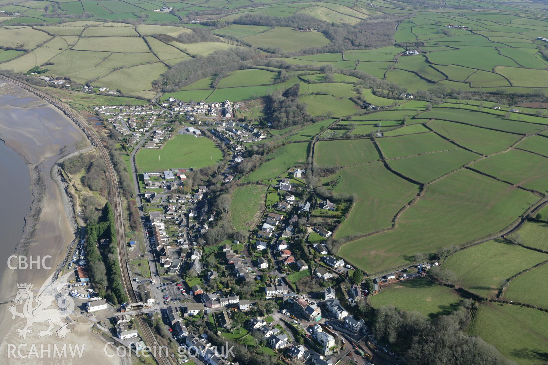 RCAHMW colour oblique photograph of Ferryside village. Taken by Toby Driver on 04/03/2008.