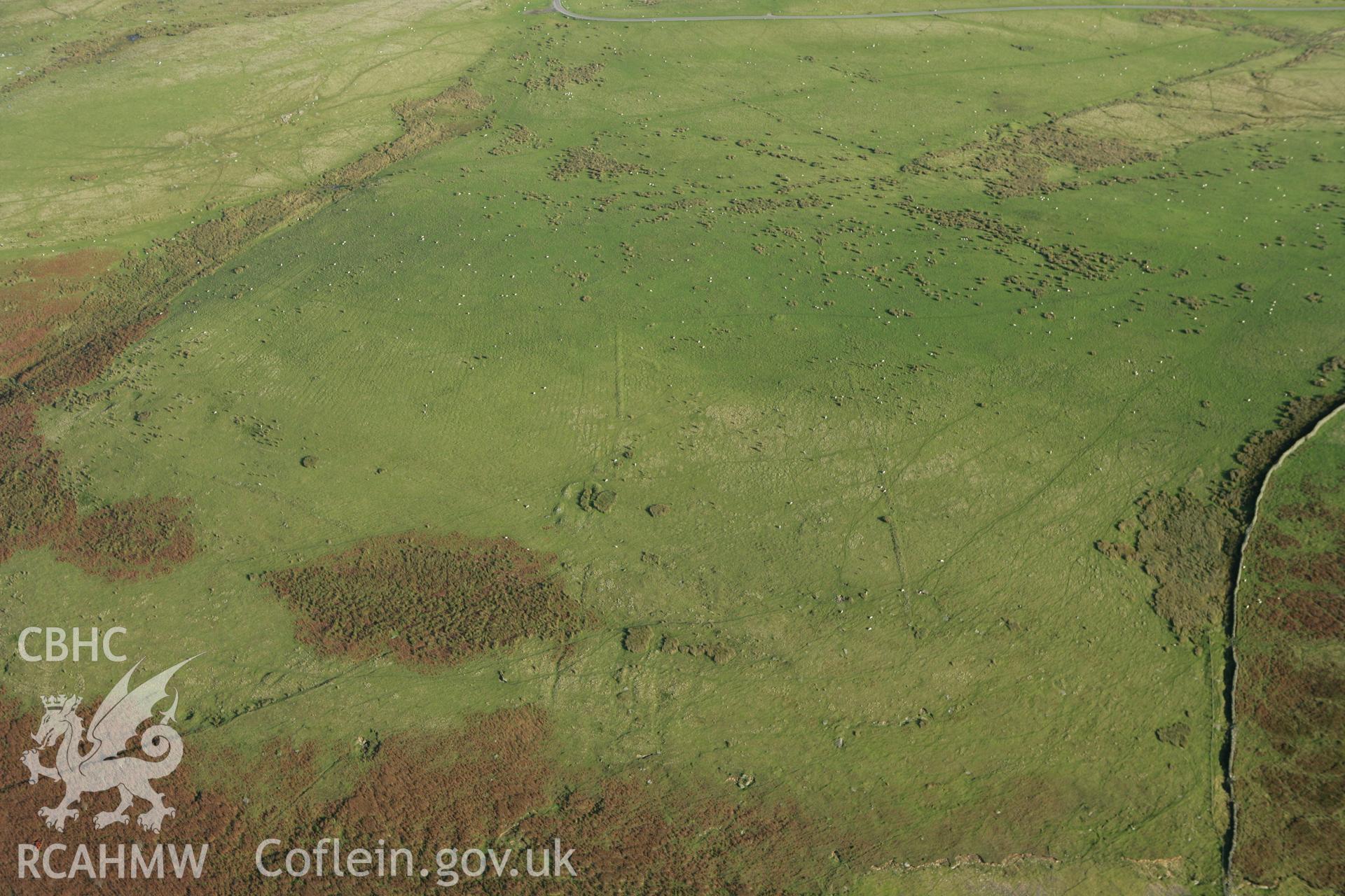 RCAHMW colour oblique photograph of Coly Uchaf Cairnfield and Dinas Noddfa Platform Houses. Taken by Toby Driver on 16/10/2008.