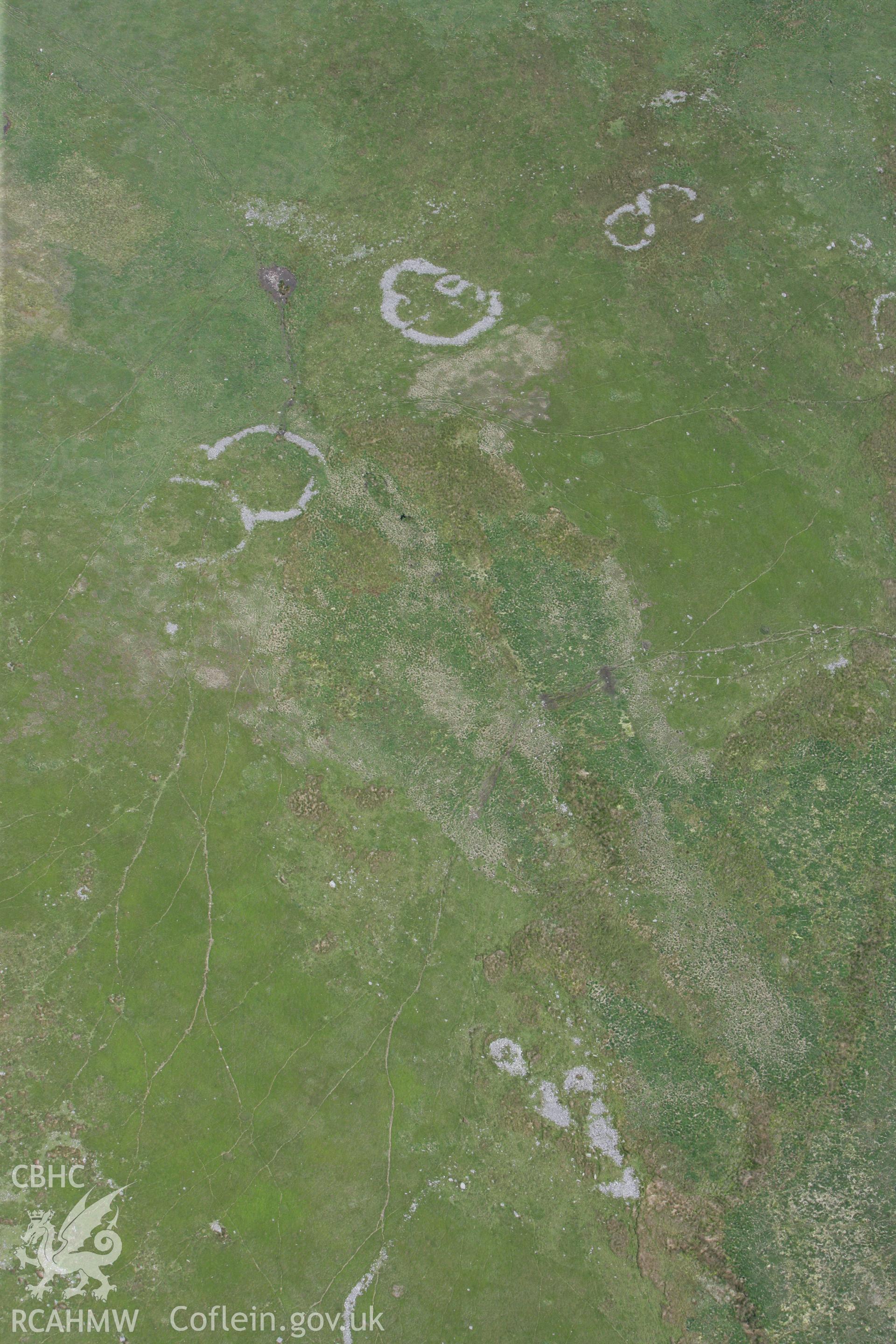 RCAHMW colour oblique photograph of Cefn Car Enclosures. Taken by Toby Driver on 09/06/2008.