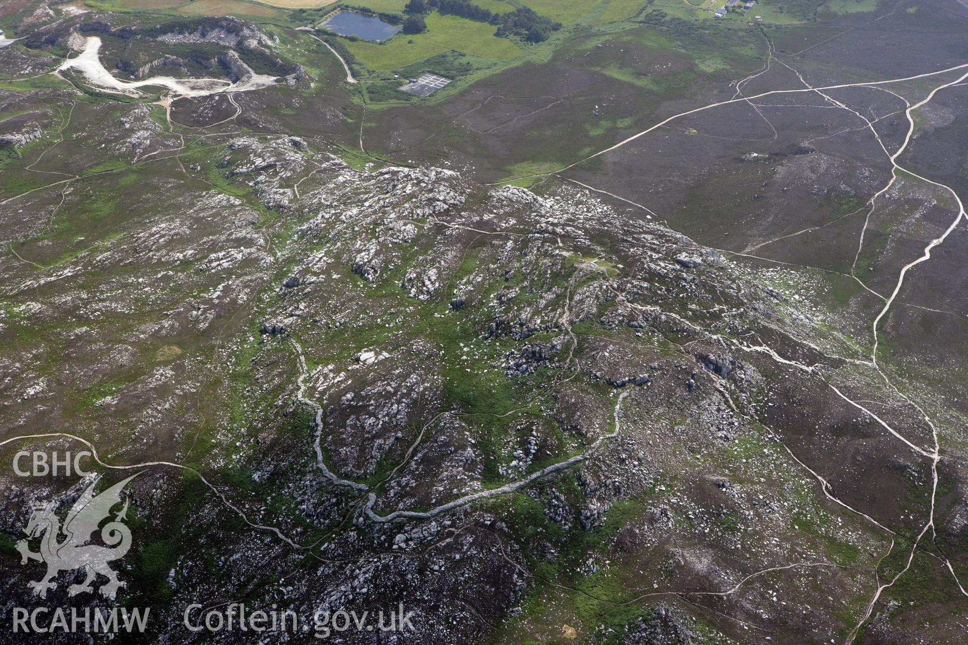 RCAHMW colour oblique photograph of Caer-y-Twr Stone Walled Roman Fort, Holyhead Mountain. Taken by Toby Driver on 13/06/2008.