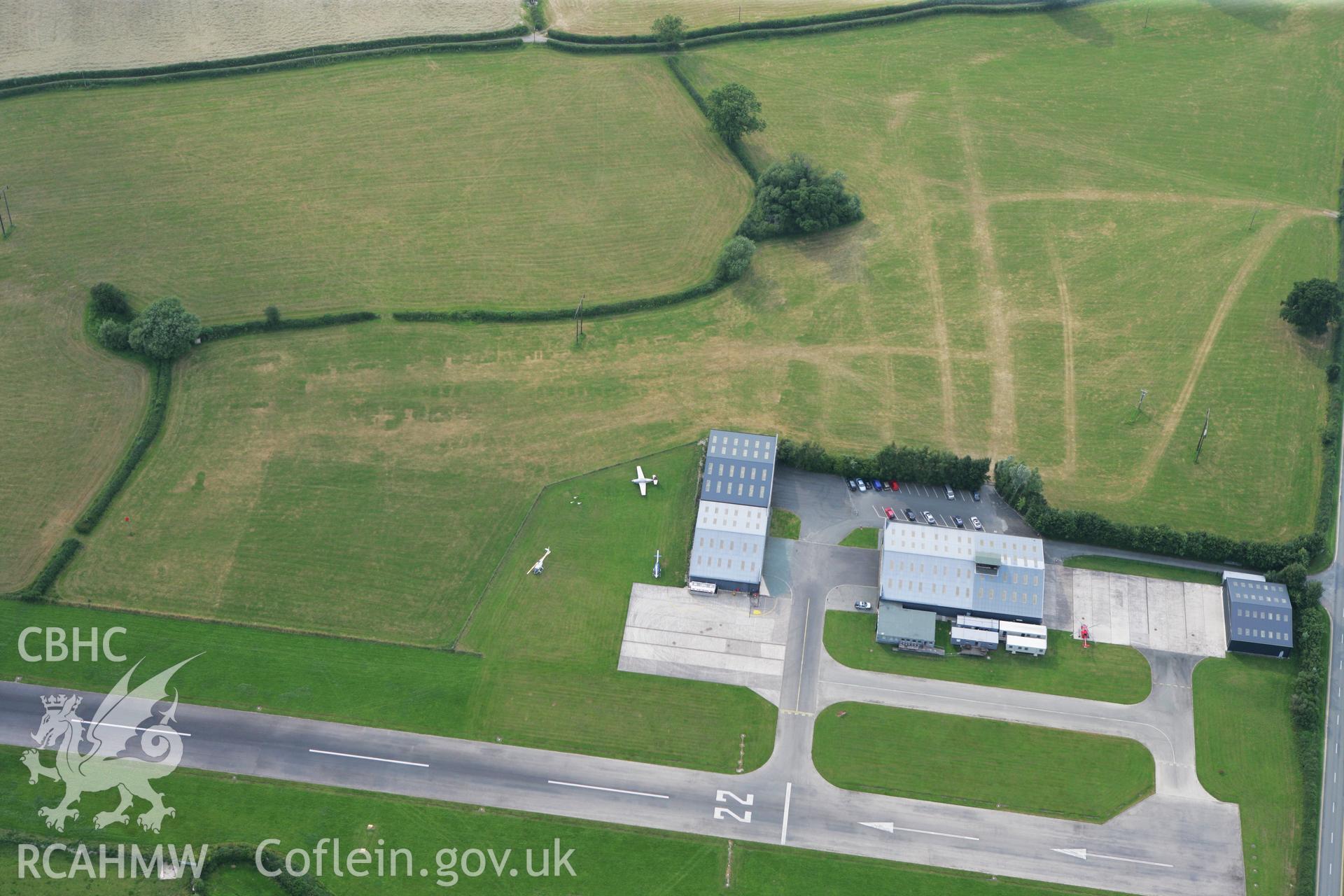 RCAHMW colour oblique photograph of Montgomeryshire Mid Wales Airport. Taken by Toby Driver on 24/07/2008.
