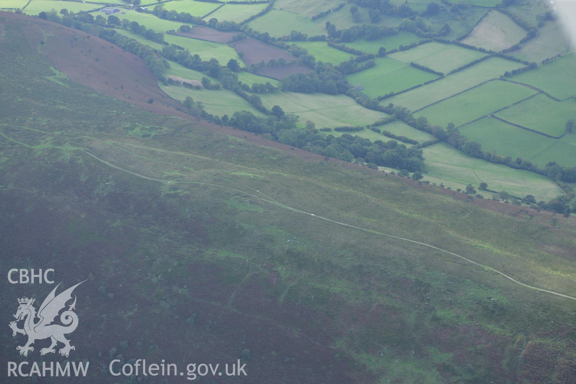 RCAHMW colour oblique photograph of Three Wells Round Cairn. Taken by Toby Driver on 10/10/2008.