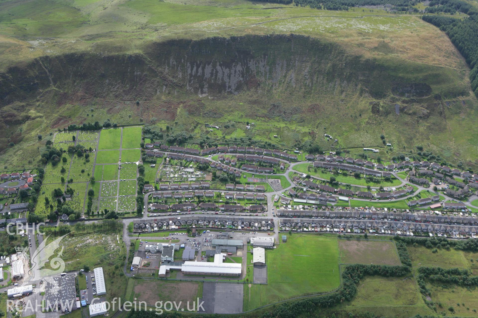 RCAHMW colour oblique photograph of housing at Ferndale, with Ferndale Cemetery. Taken by Toby Driver on 12/09/2008.