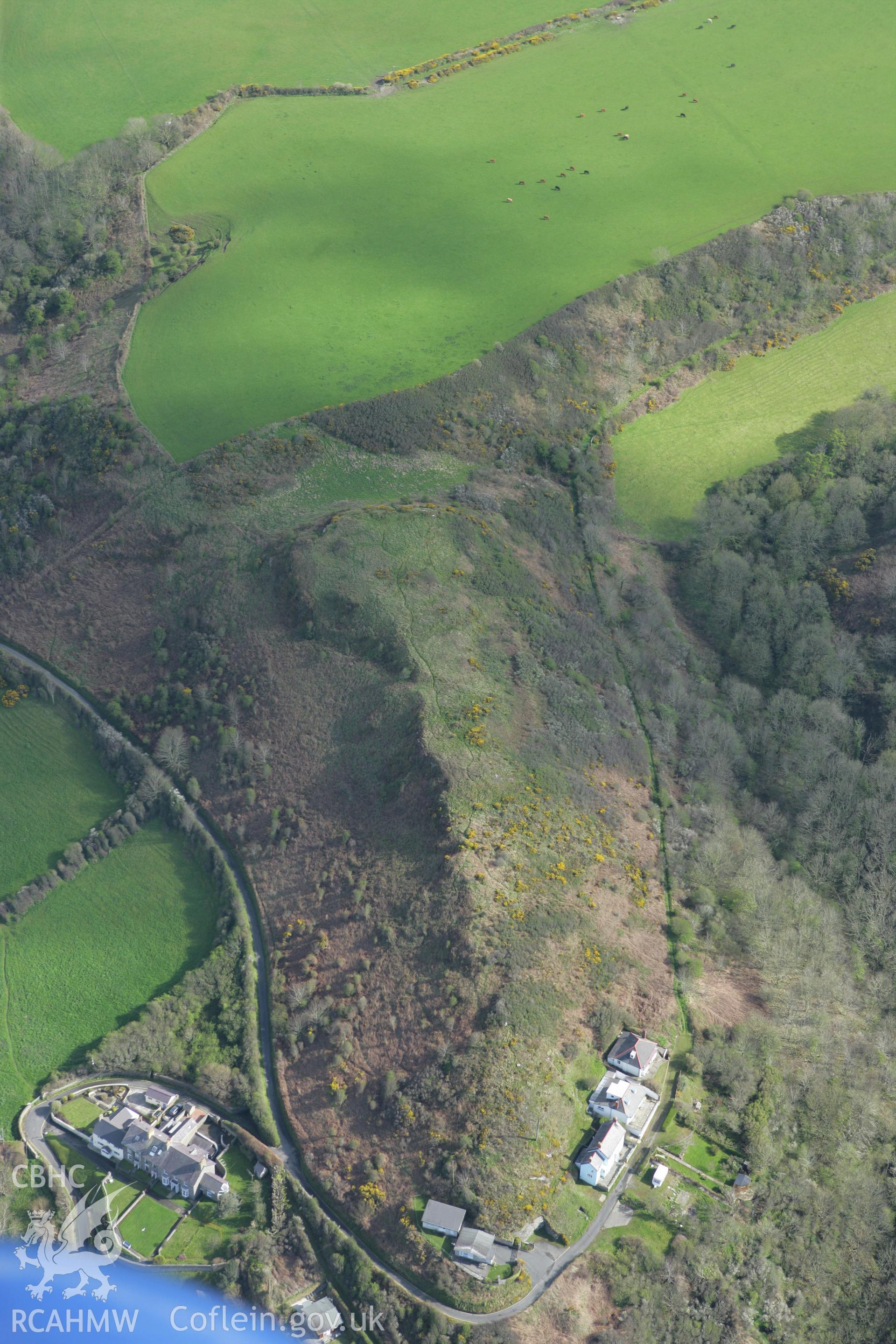 RCAHMW colour oblique photograph of ridge and housing on the western edge of Llangrannog. Taken by Toby Driver on 24/04/2008.