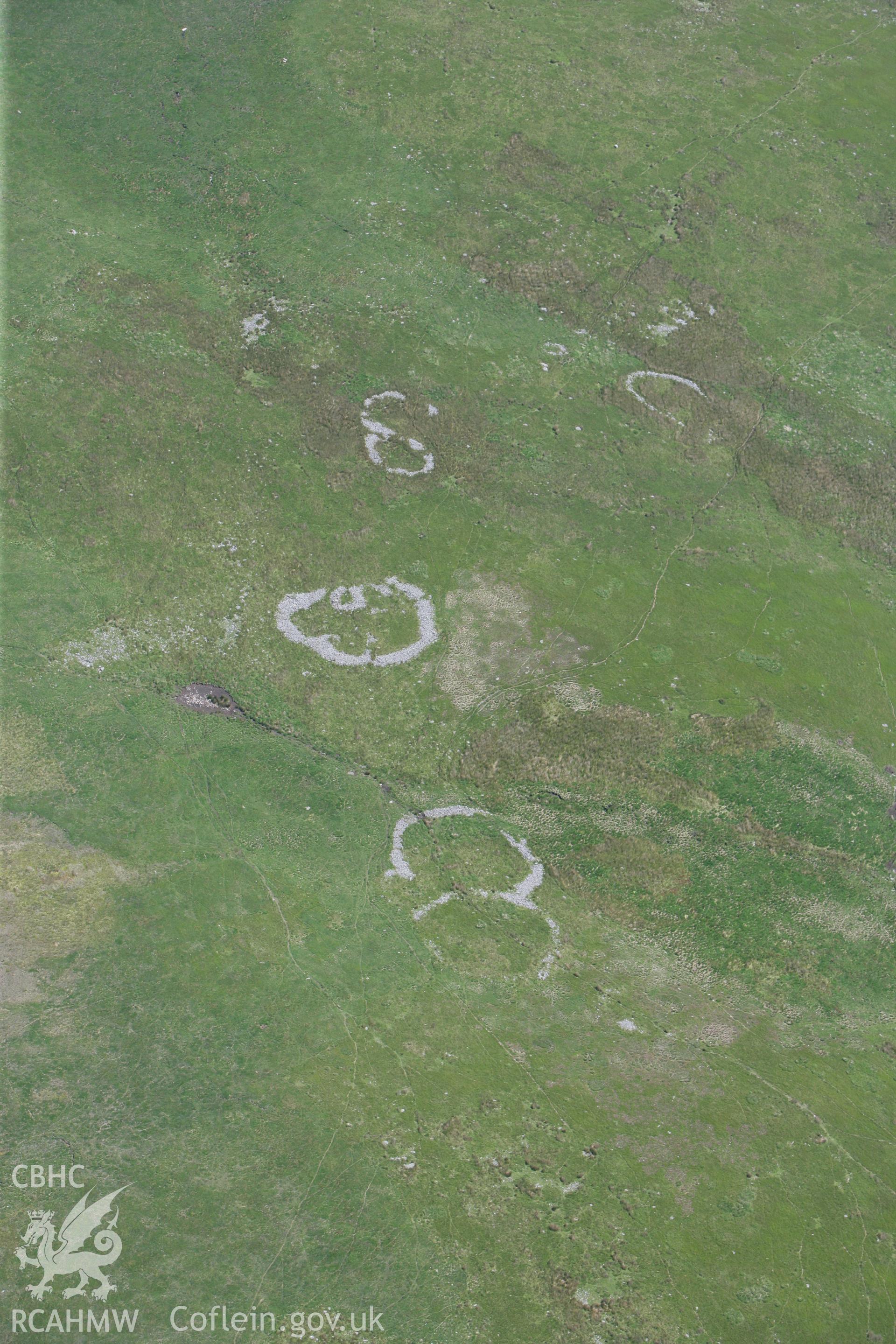 RCAHMW colour oblique photograph of Cefn Car Enclosures. Taken by Toby Driver on 09/06/2008.
