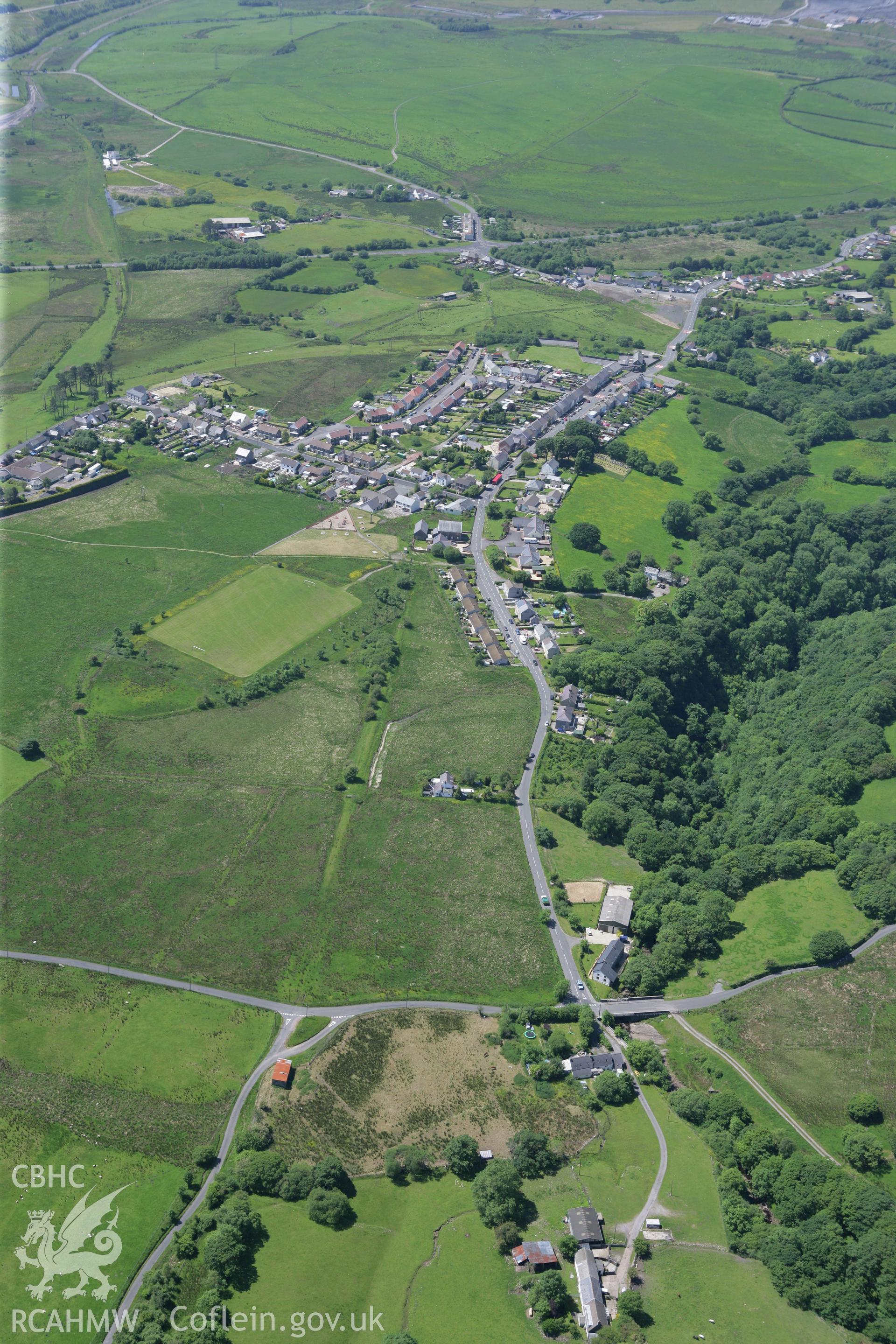 RCAHMW colour oblique photograph of Coelbren village, from the east. Taken by Toby Driver on 09/06/2008.