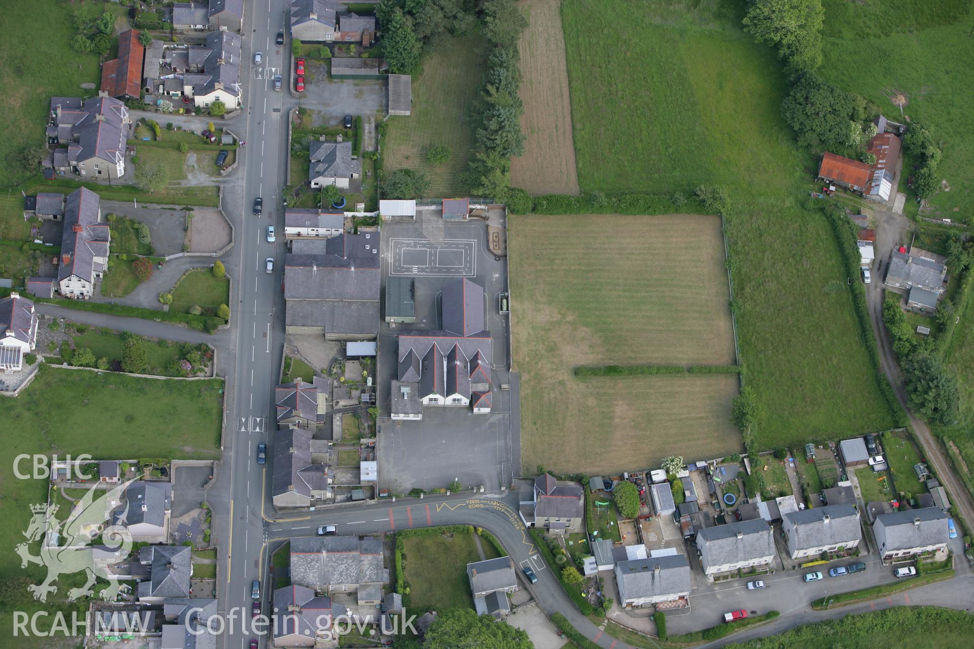 RCAHMW colour oblique photograph of Ysgol Gynradd Chwilog. Taken by Toby Driver on 13/06/2008.