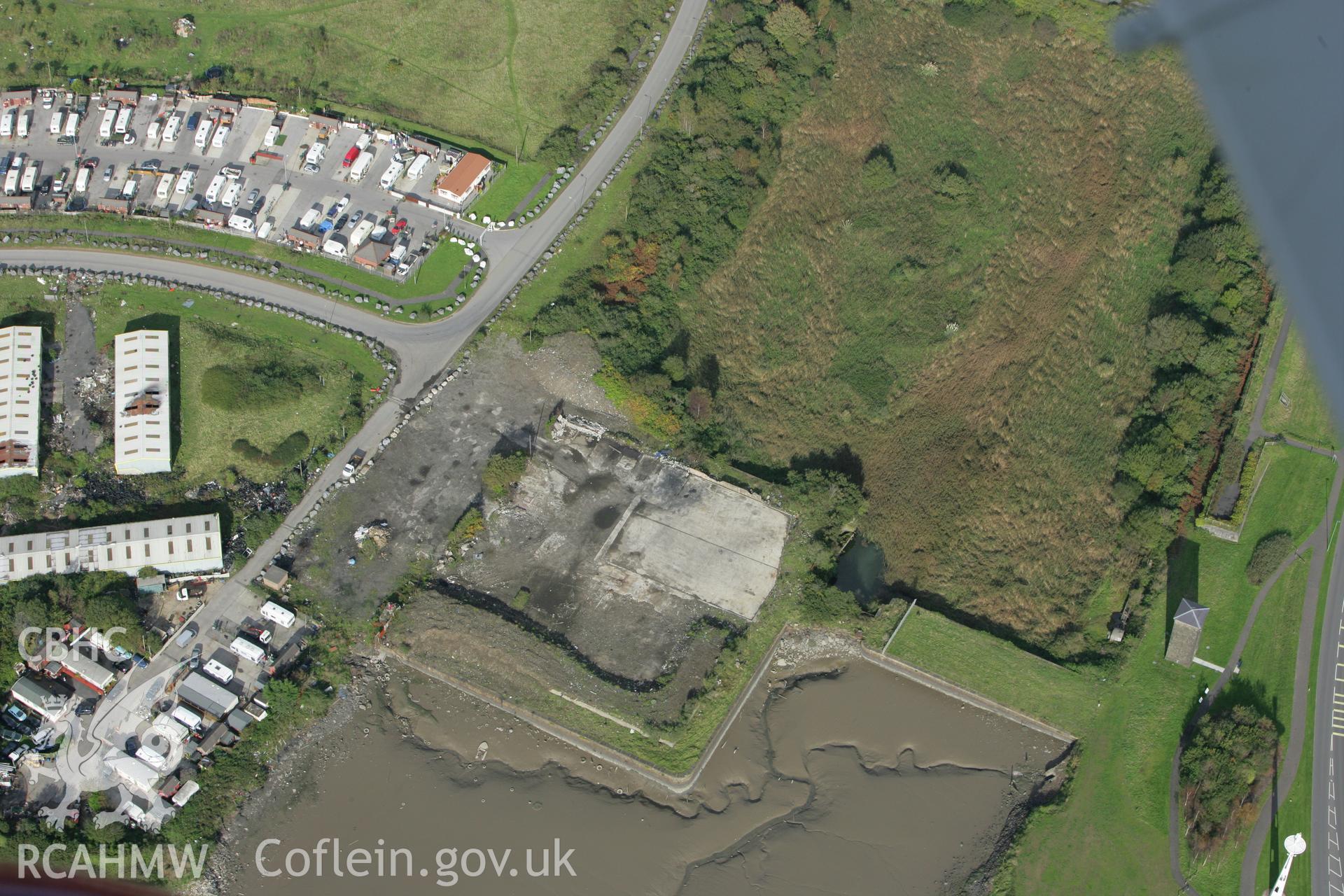 RCAHMW colour oblique photograph of Briton Ferry Dock Entrance. Taken by Toby Driver on 16/10/2008.