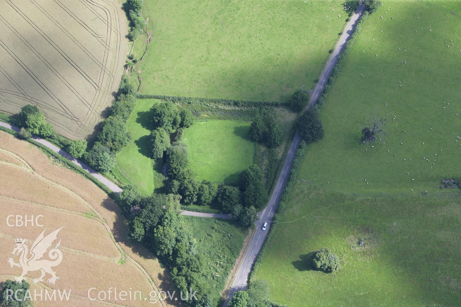 RCAHMW colour oblique photograph of Hen Gwrt Moated Site, Llantilio Crossenny. Taken by Toby Driver on 21/07/2008.