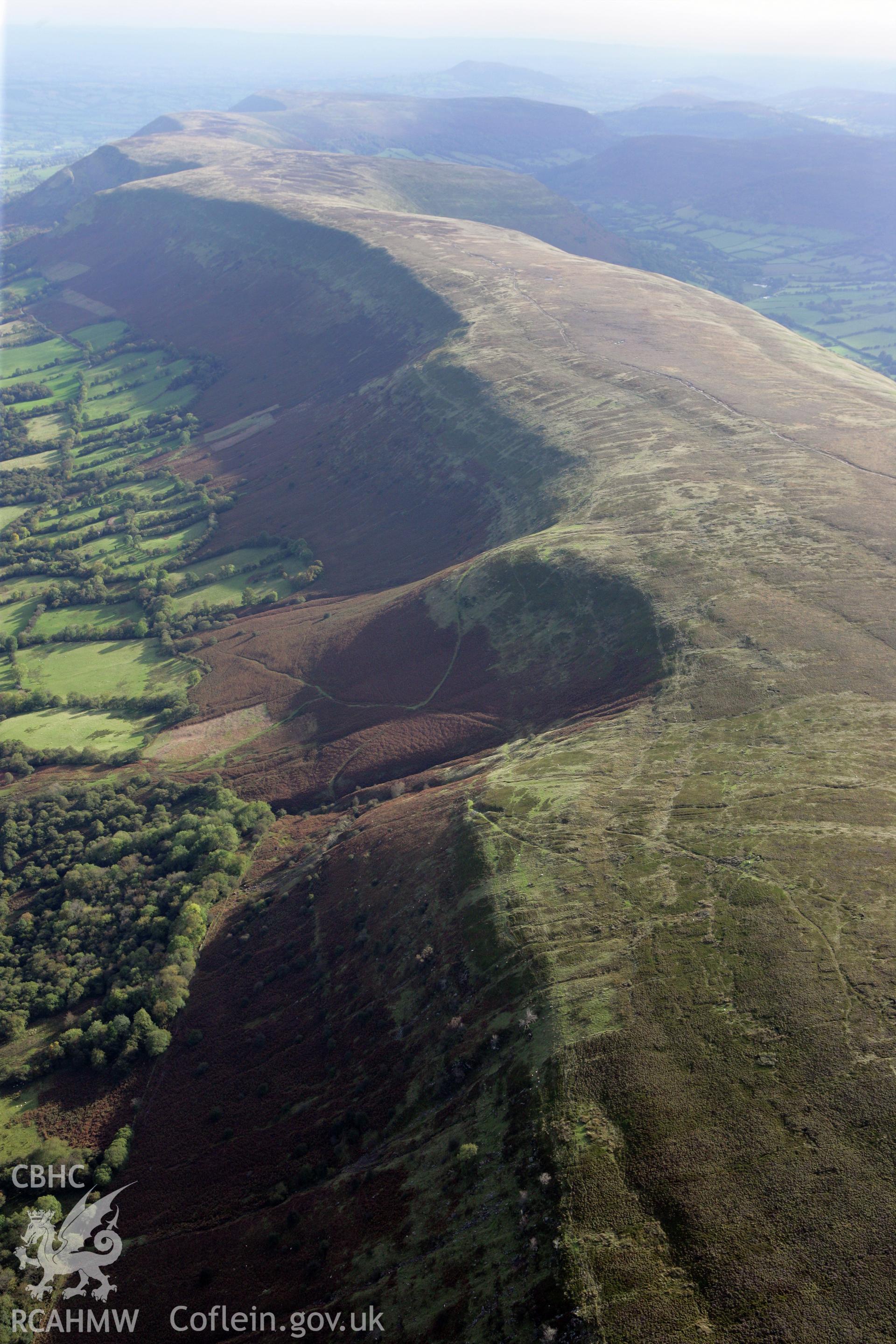 RCAHMW colour oblique photograph of landscape looking south-east towards Loxbridge Tump from Hay Bluff. Taken by Toby Driver on 10/10/2008.