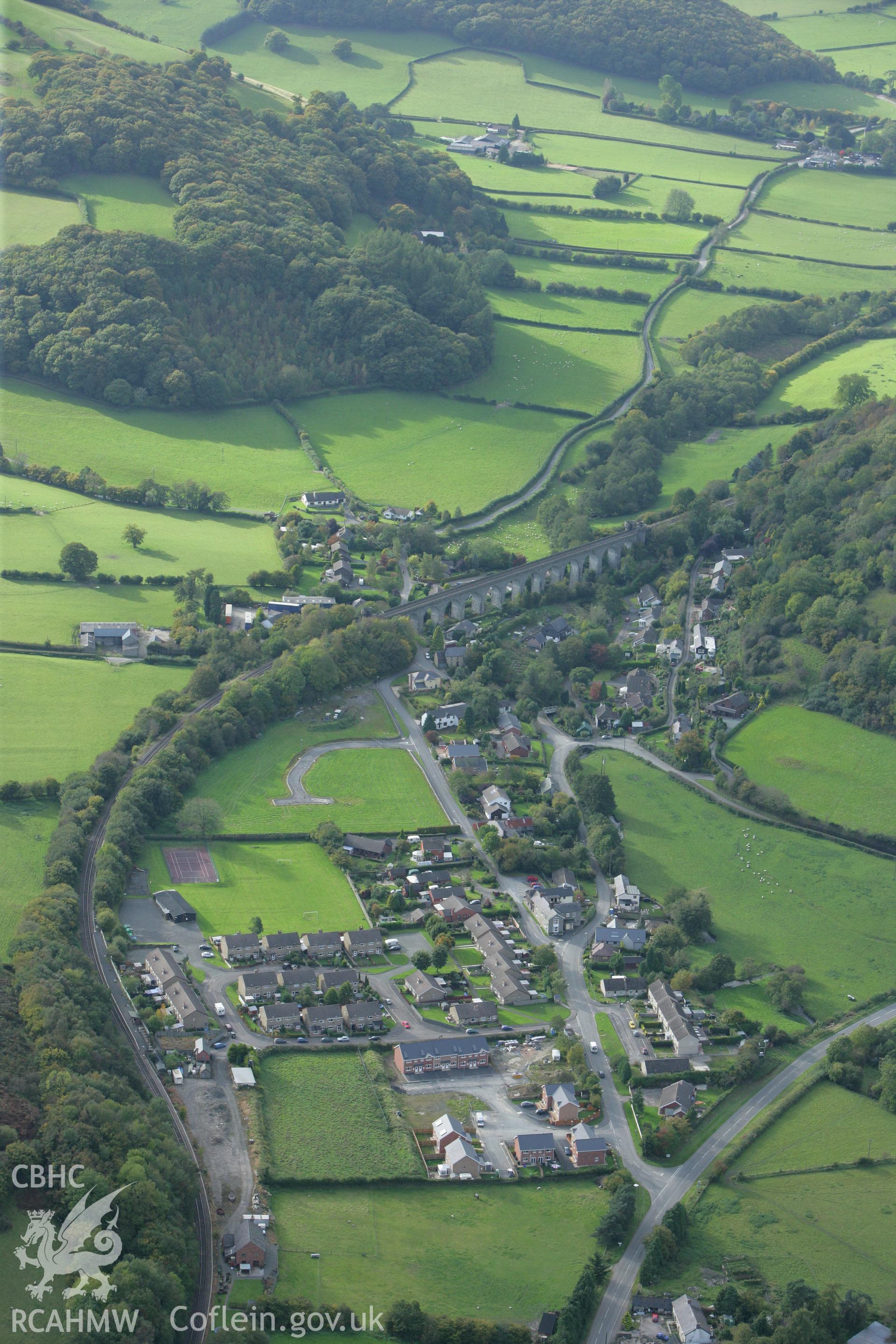 RCAHMW colour oblique photograph of Knucklas, viaduct and village, from the east. Taken by Toby Driver on 10/10/2008.