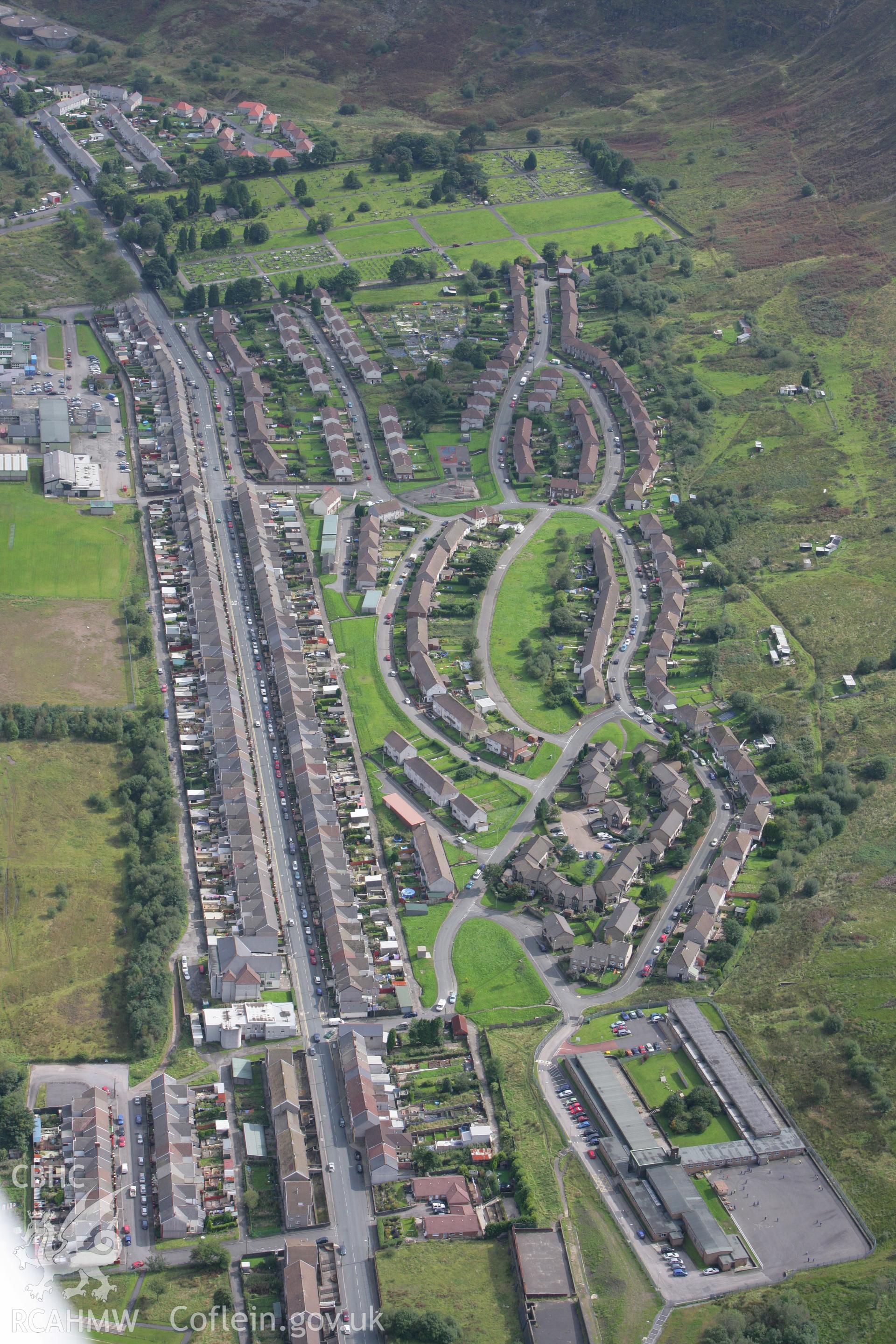 RCAHMW colour oblique photograph of housing at Ferndale, with Ferndale Cemetery. Taken by Toby Driver on 12/09/2008.