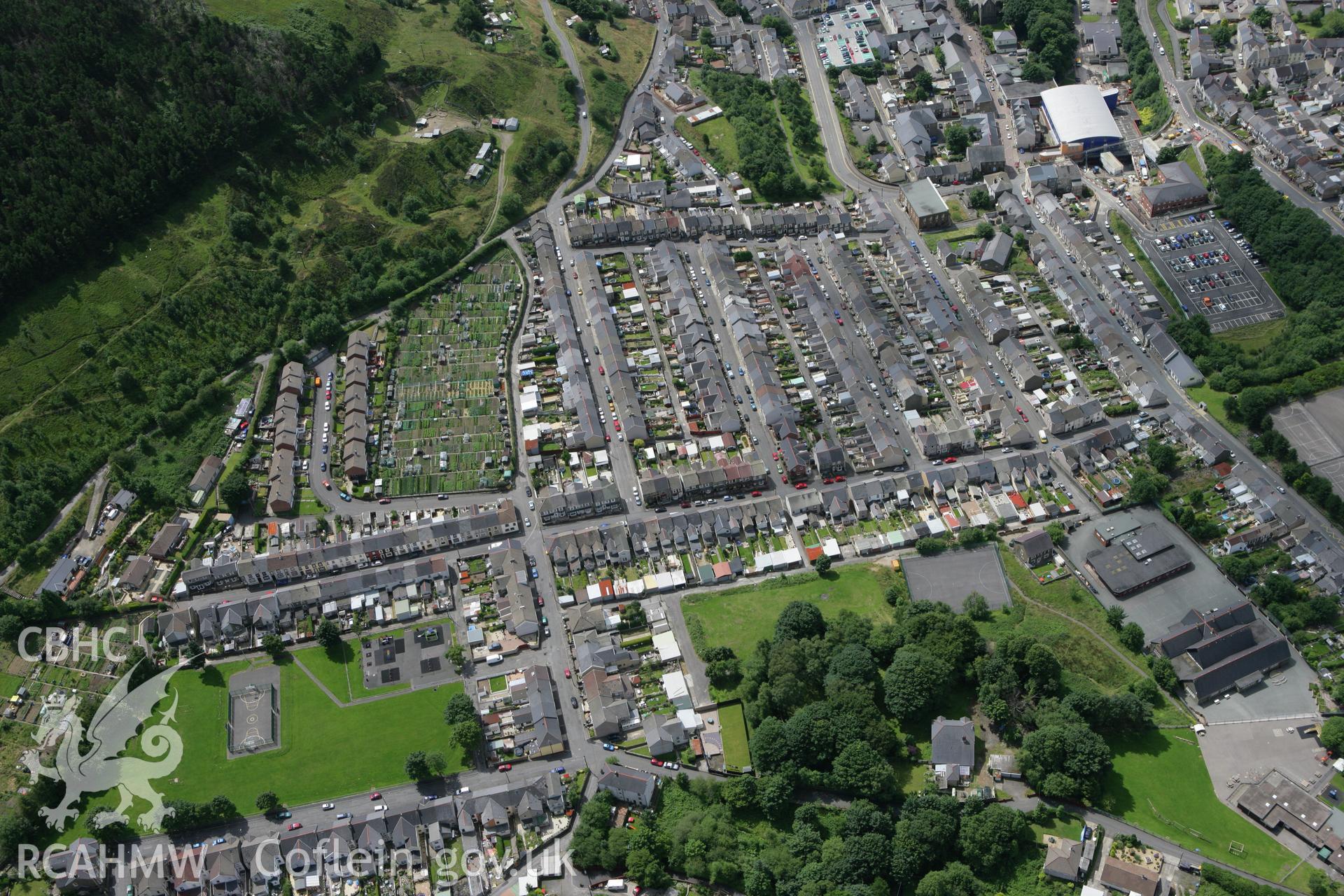 RCAHMW colour oblique photograph of Abertilley townscape, with Abertilley Primary School. Taken by Toby Driver on 21/07/2008.