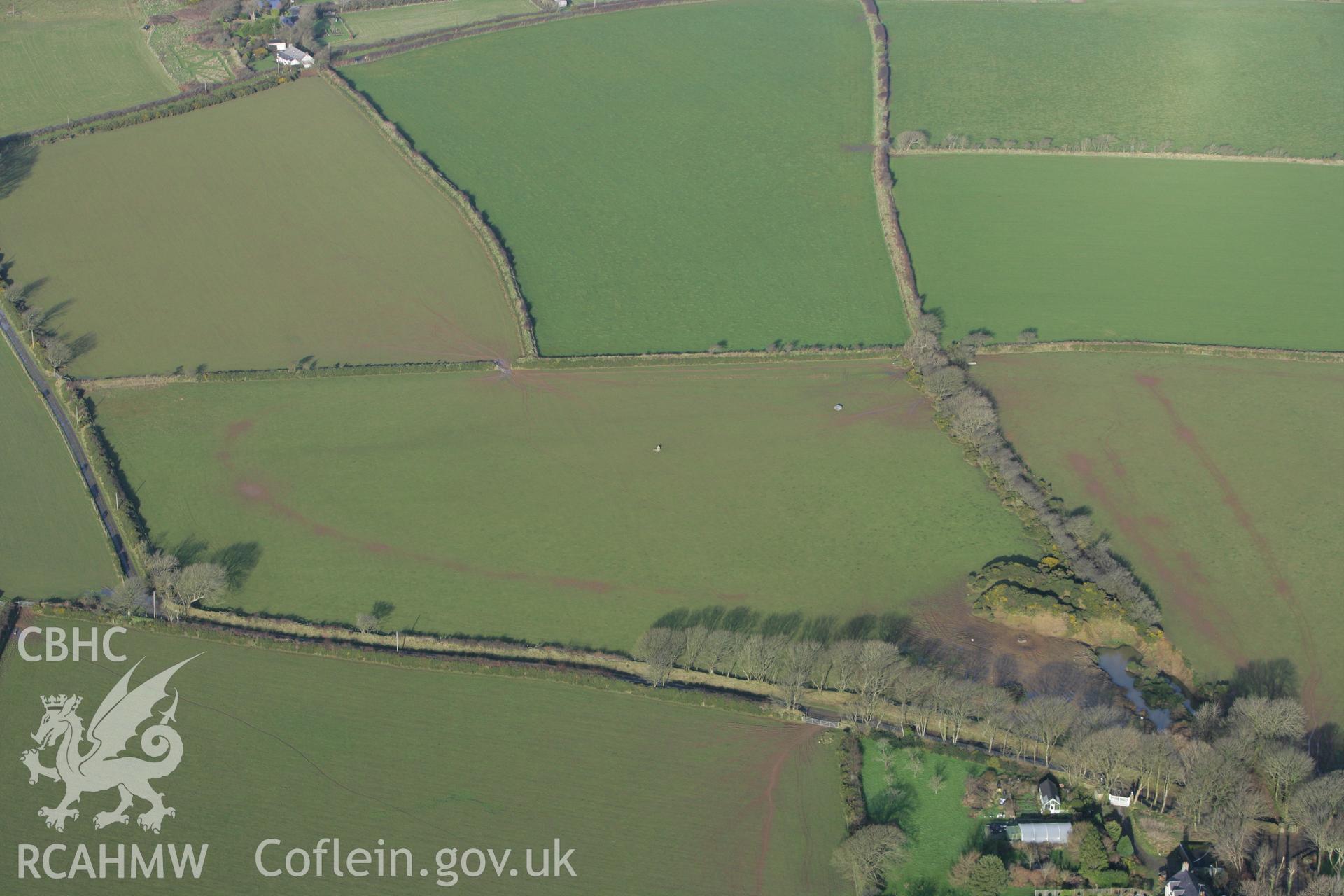 RCAHMW colour oblique photograph of Standing stone 270m north-west of Trehale house. Taken by Toby Driver on 15/12/2008.