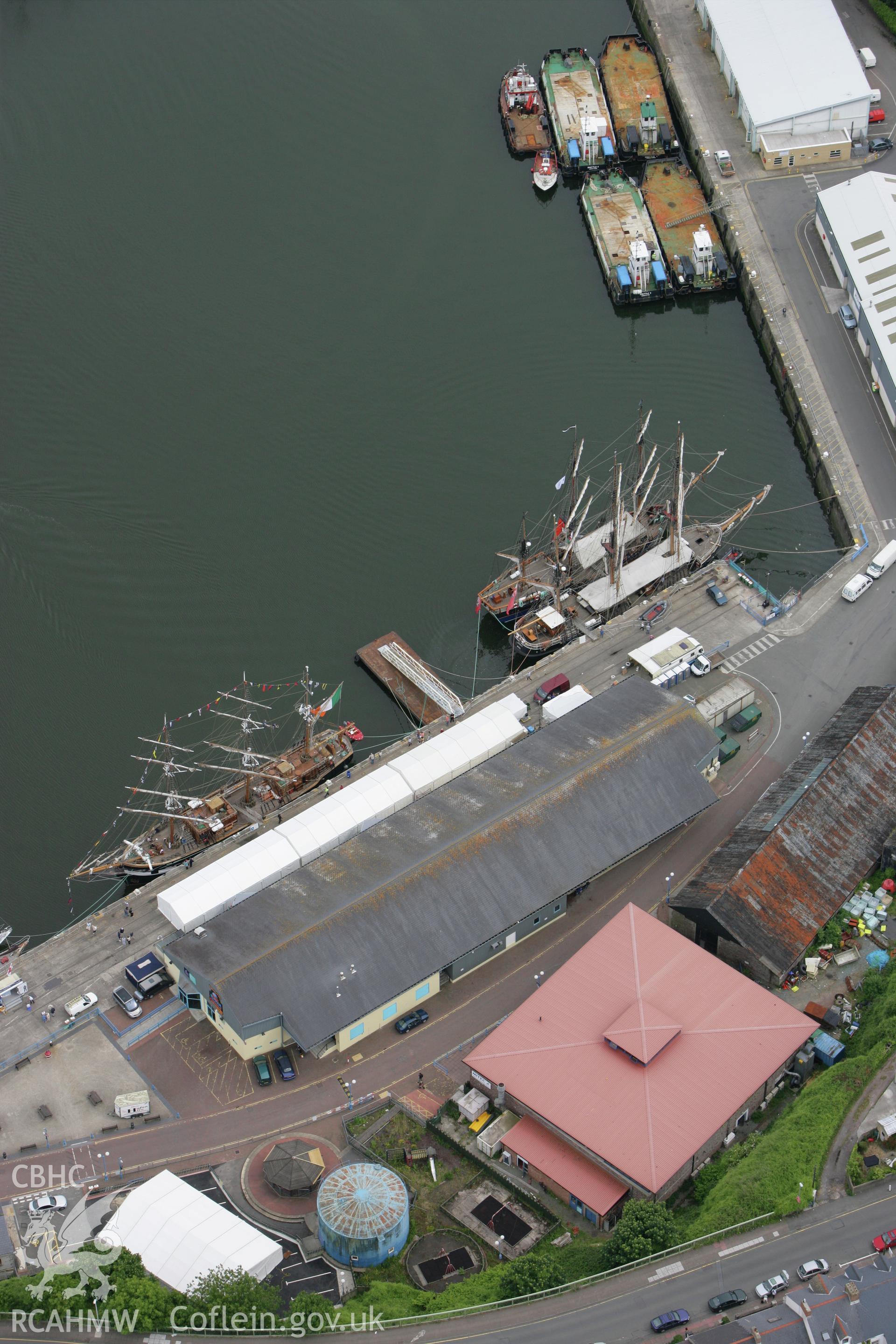 RCAHMW colour oblique photograph of Tall Ships, Milford Haven Regatta, Milford Haven Docks. Taken by Toby Driver on 20/06/2008.