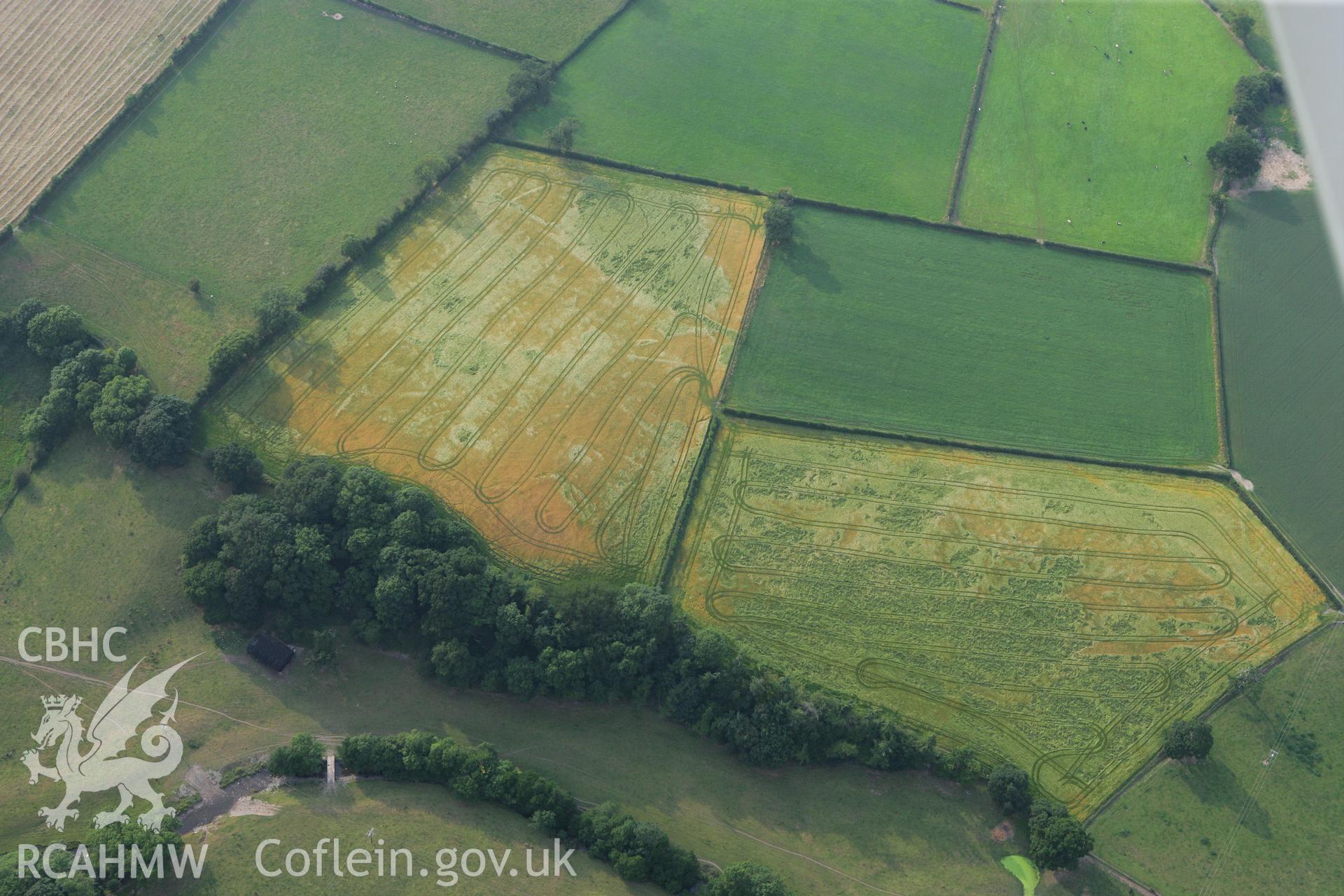 RCAHMW colour oblique photograph of Pennant Farm Cropmarks. Taken by Toby Driver on 24/07/2008.