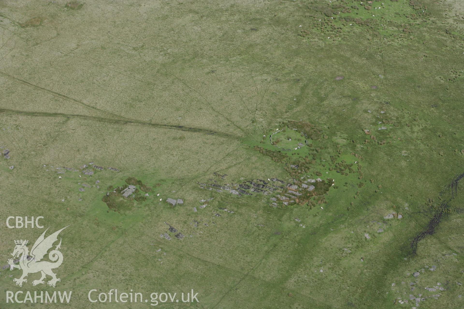 RCAHMW colour oblique photograph of Carn Llechart, with Burial Chamber nearby. Taken by Toby Driver on 12/09/2008.