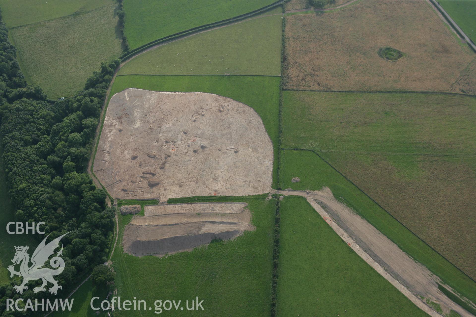 RCAHMW colour oblique photograph of Excavations, Dinorben Hillfort. Taken by Toby Driver on 24/07/2008.