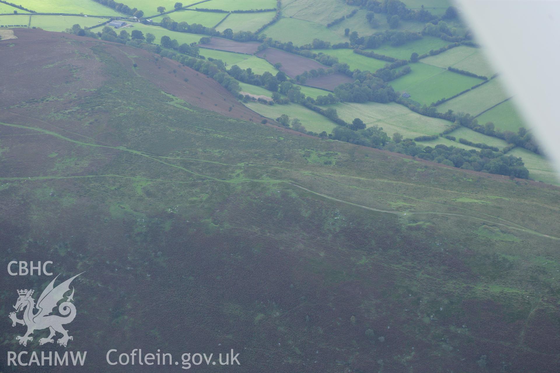 RCAHMW colour oblique photograph of Three Wells Round Cairn. Taken by Toby Driver on 10/10/2008.