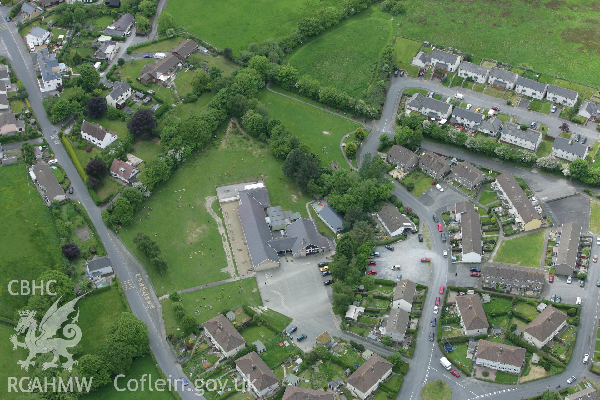 RCAHMW colour oblique photograph of Comins Coch Primary School. Taken by Toby Driver on 20/05/2008.