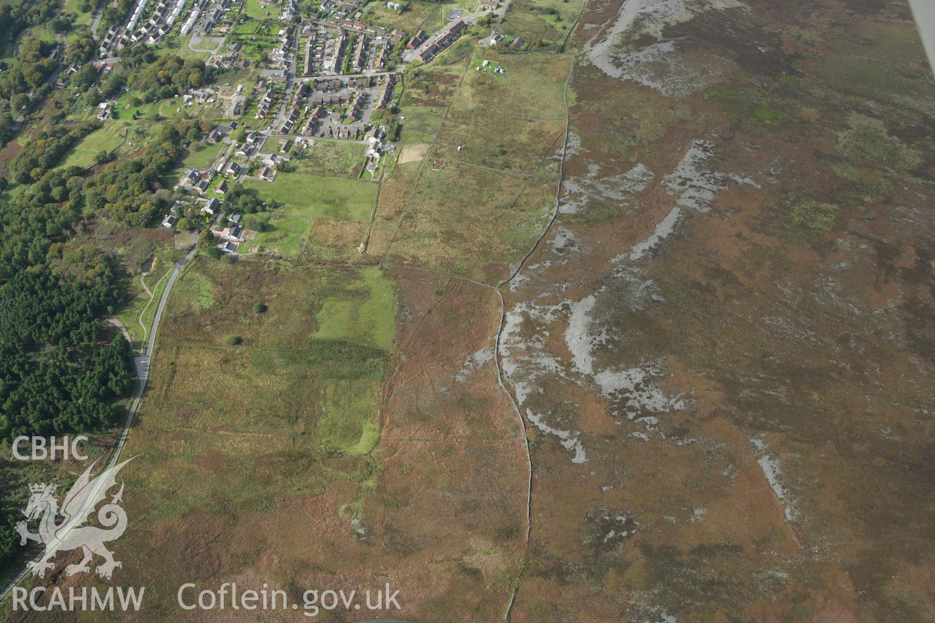 RCAHMW colour oblique photograph of site of Coedcae Reservoir and Leats. Taken by Toby Driver on 10/10/2008.