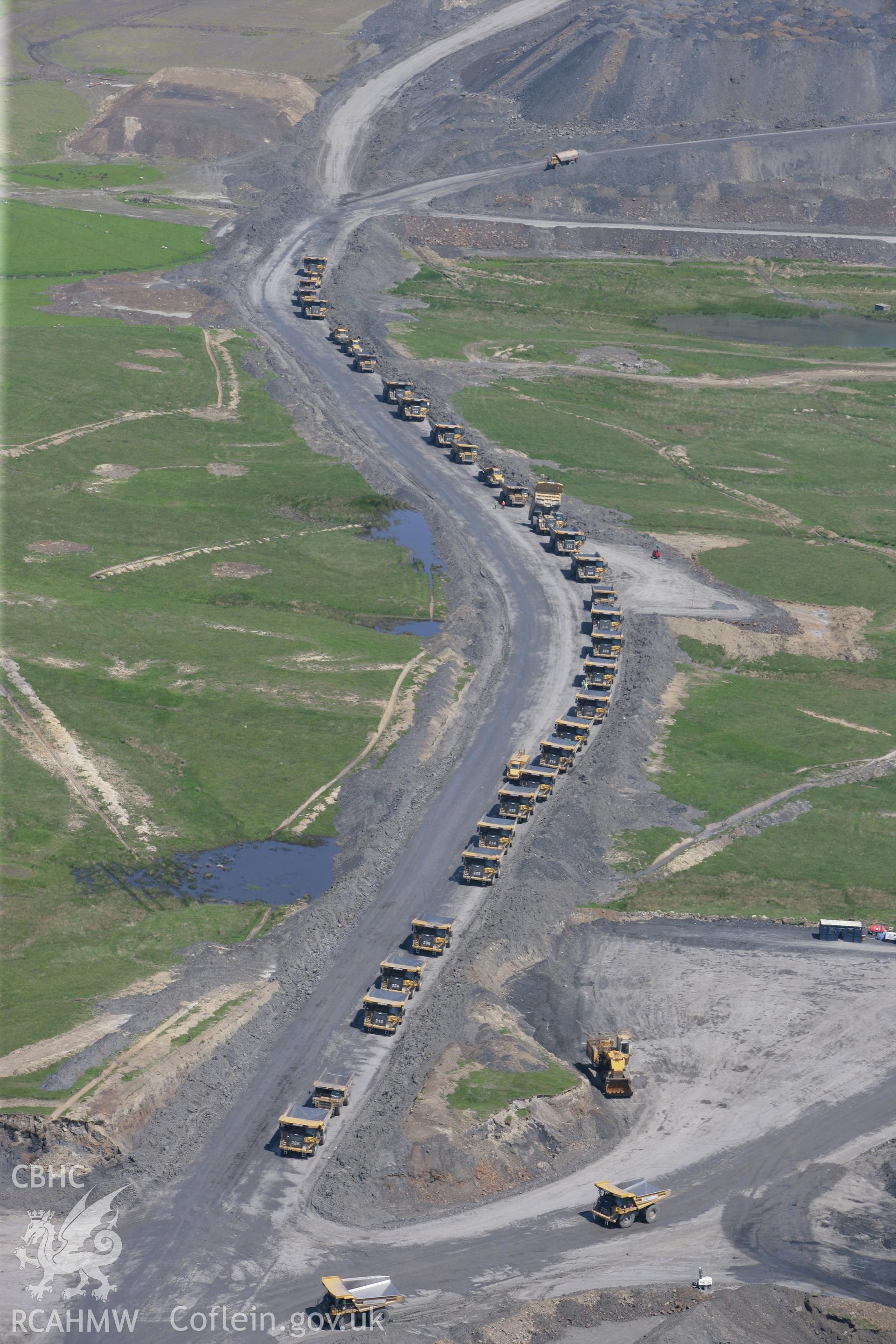 RCAHMW colour oblique photograph of lorries at Ffos-y-fran Dowlais Opencast workings. Taken by Toby Driver on 09/06/2008.