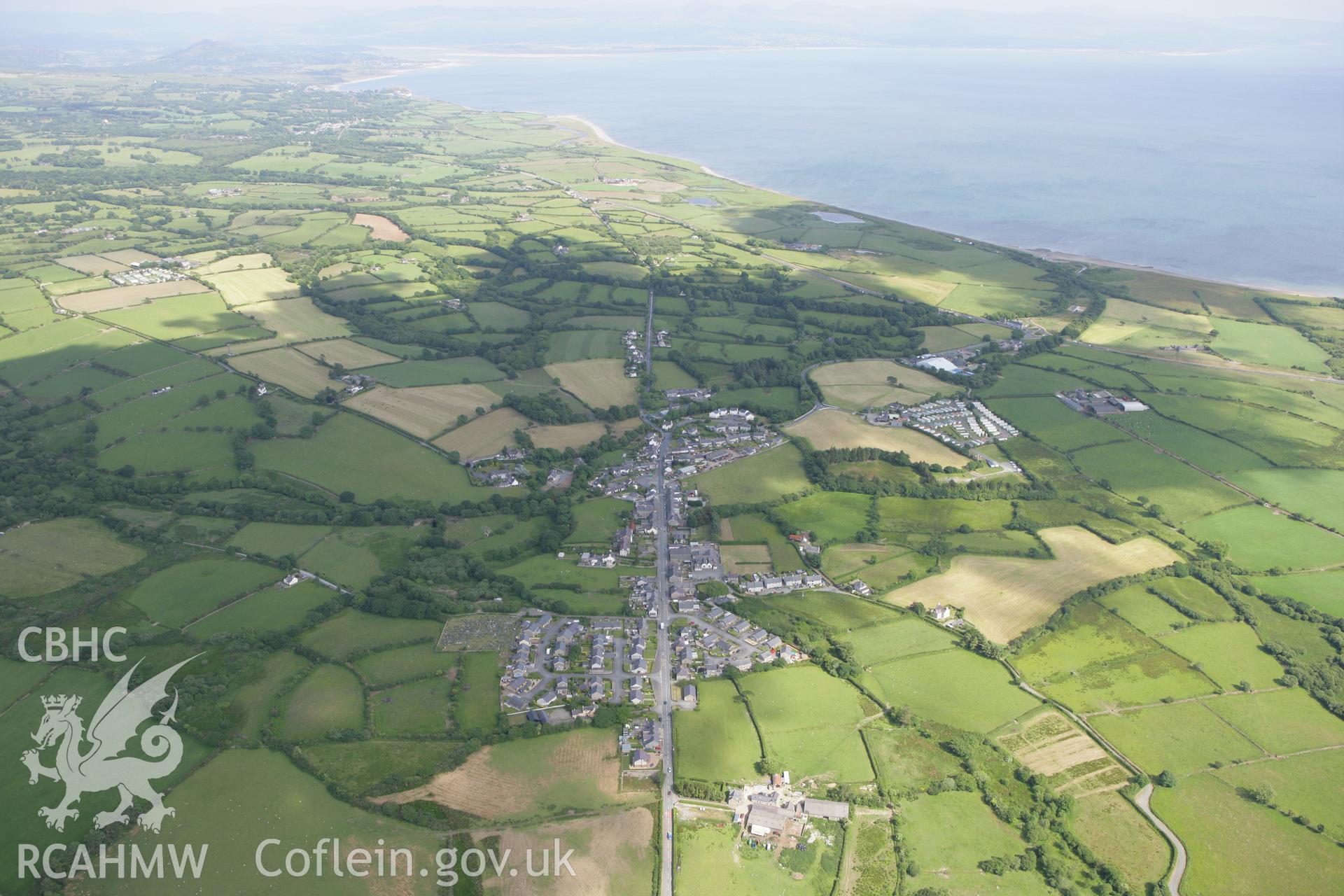 RCAHMW colour oblique photograph of Chwilog village, view from the west. Taken by Toby Driver on 13/06/2008.