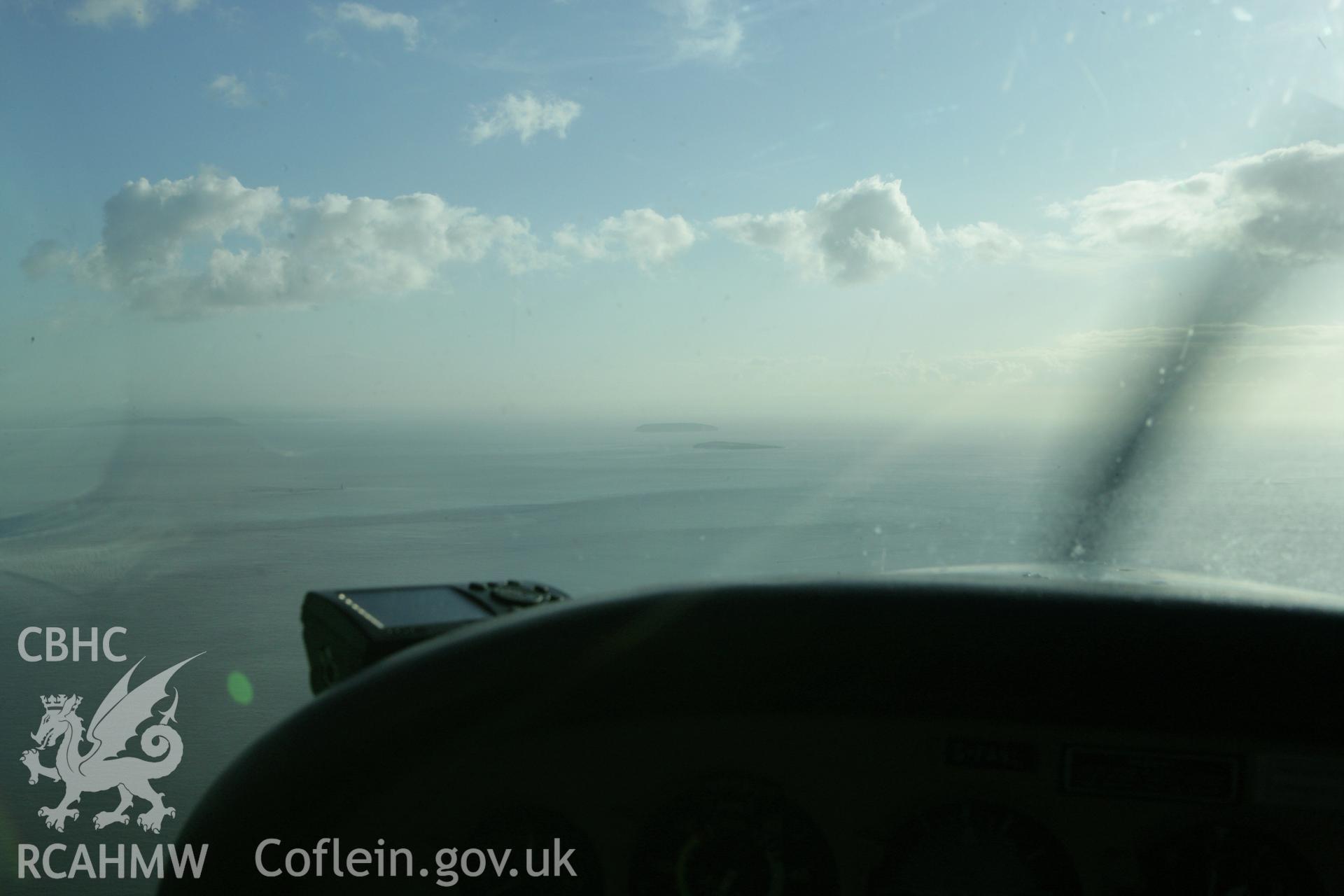 RCAHMW colour oblique photograph of Flat Holm and Steep Holm, from the north, with aircraft cockpit. Taken by Toby Driver on 12/11/2008.
