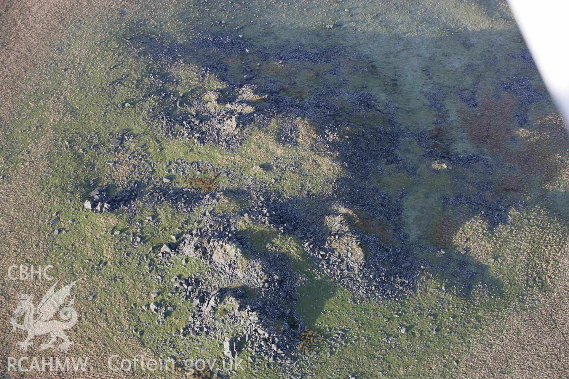 RCAHMW colour oblique photograph of Carn Breseb, south of Carn Alw Hillfort. Taken by Toby Driver on 15/12/2008.