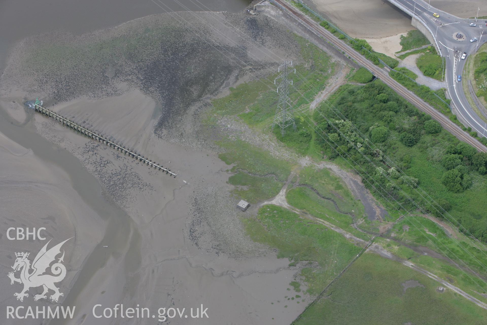 RCAHMW colour oblique photograph of drainage outlet revealed at low tide, Loughor Bridge. Taken by Toby Driver on 20/06/2008.