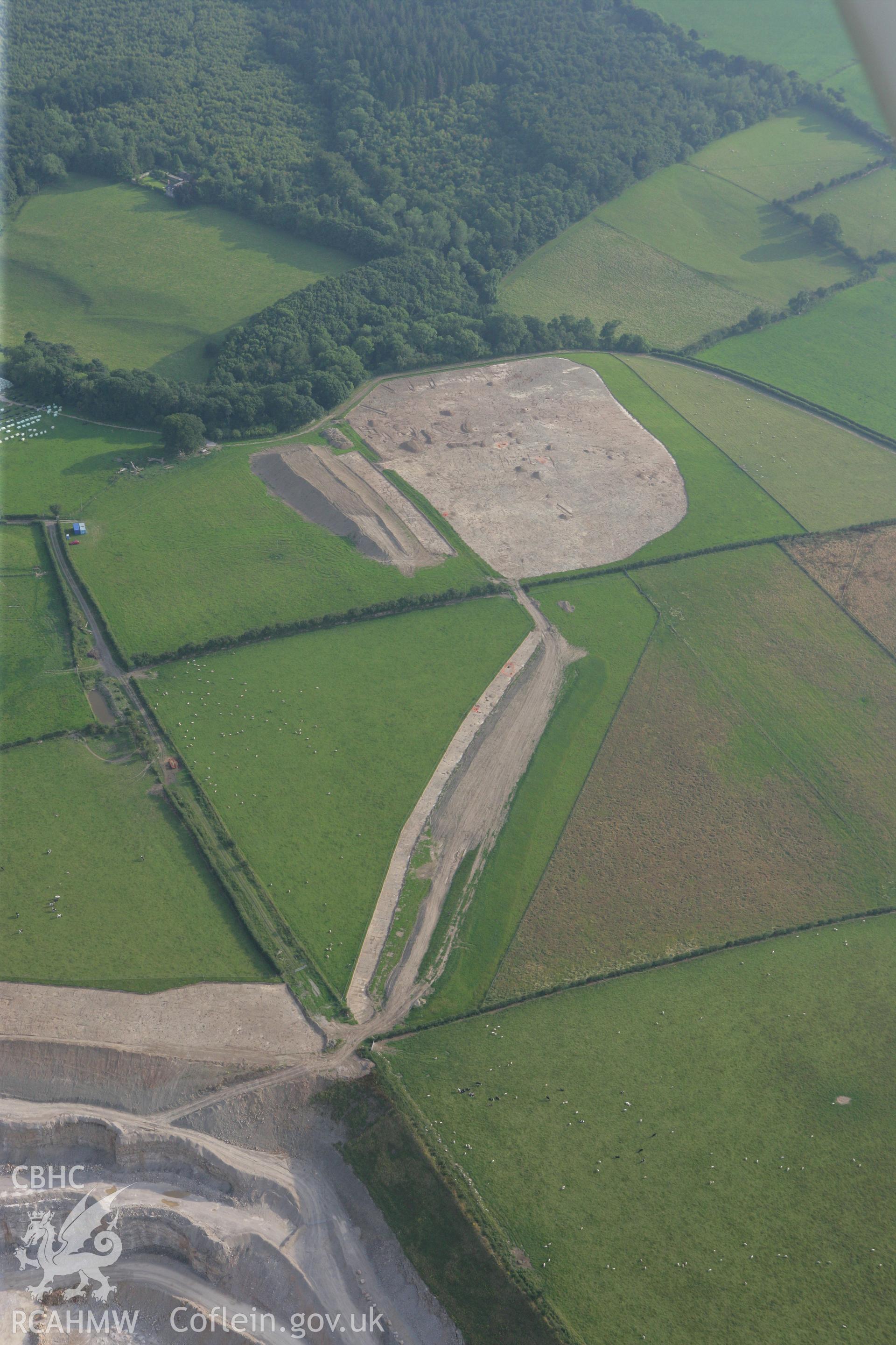 RCAHMW colour oblique photograph of Excavations, Dinorben Hillfort. Taken by Toby Driver on 24/07/2008.