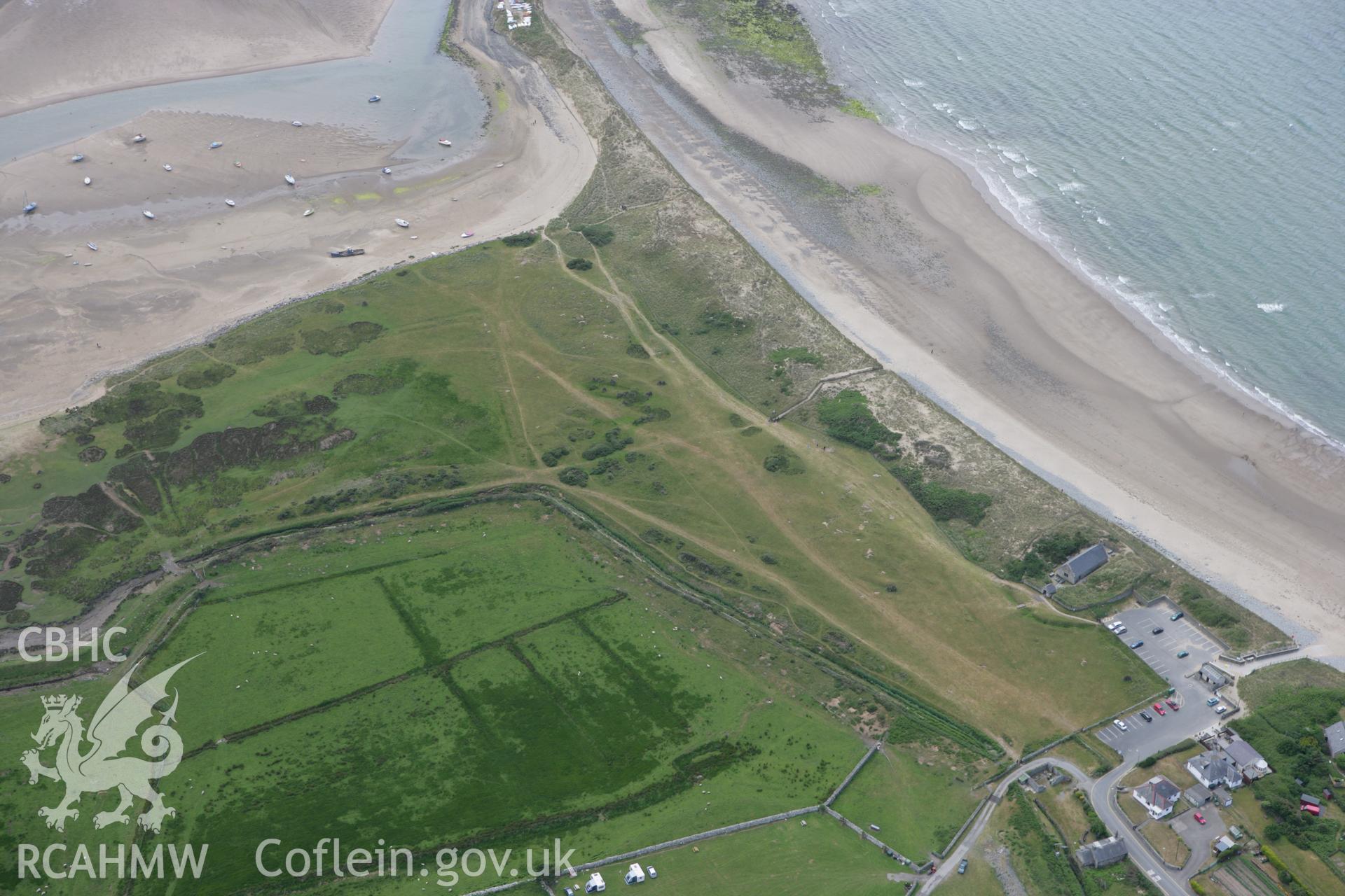 RCAHMW colour oblique photograph of Y Maes, enclosure, Llandanwg. Taken by Toby Driver on 13/06/2008.