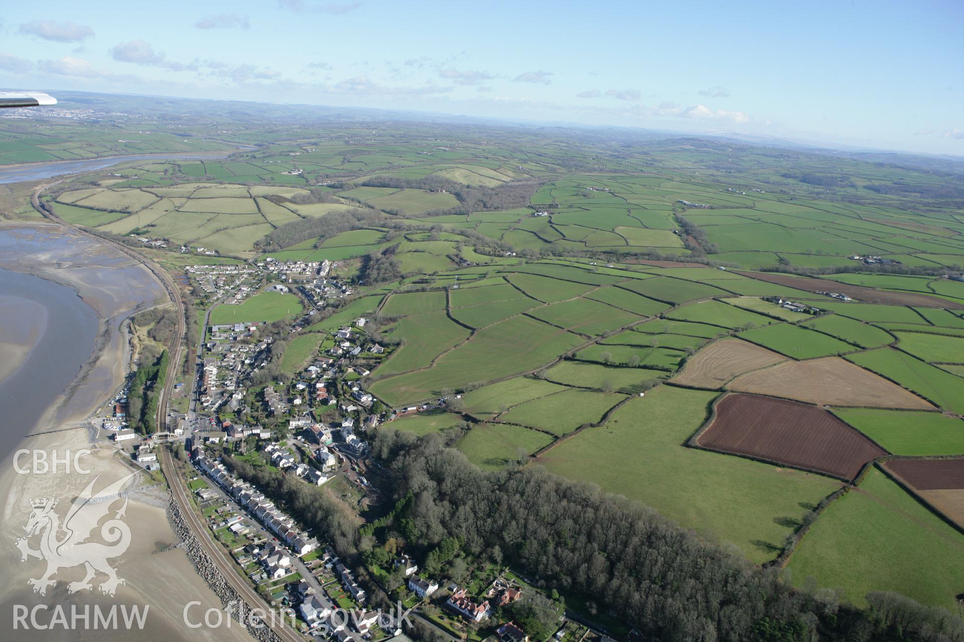 RCAHMW colour oblique photograph of Ferryside village. Taken by Toby Driver on 04/03/2008.